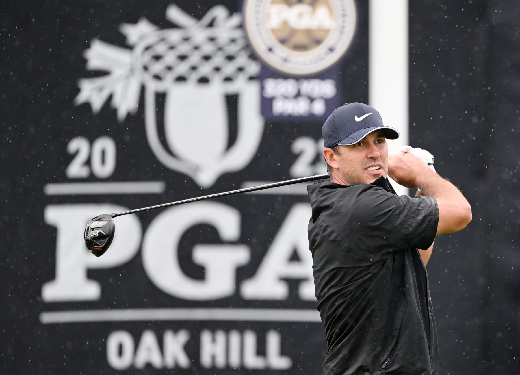 ROCHESTER, NEW YORK - MAY 20: Brooks Koepka of the United States plays his shot from the first tee during the third round of the 2023 PGA Championship at Oak Hill Country Club on May 20, 2023 in Rochester, New York. (Photo by Ross Kinnaird/Getty Images)