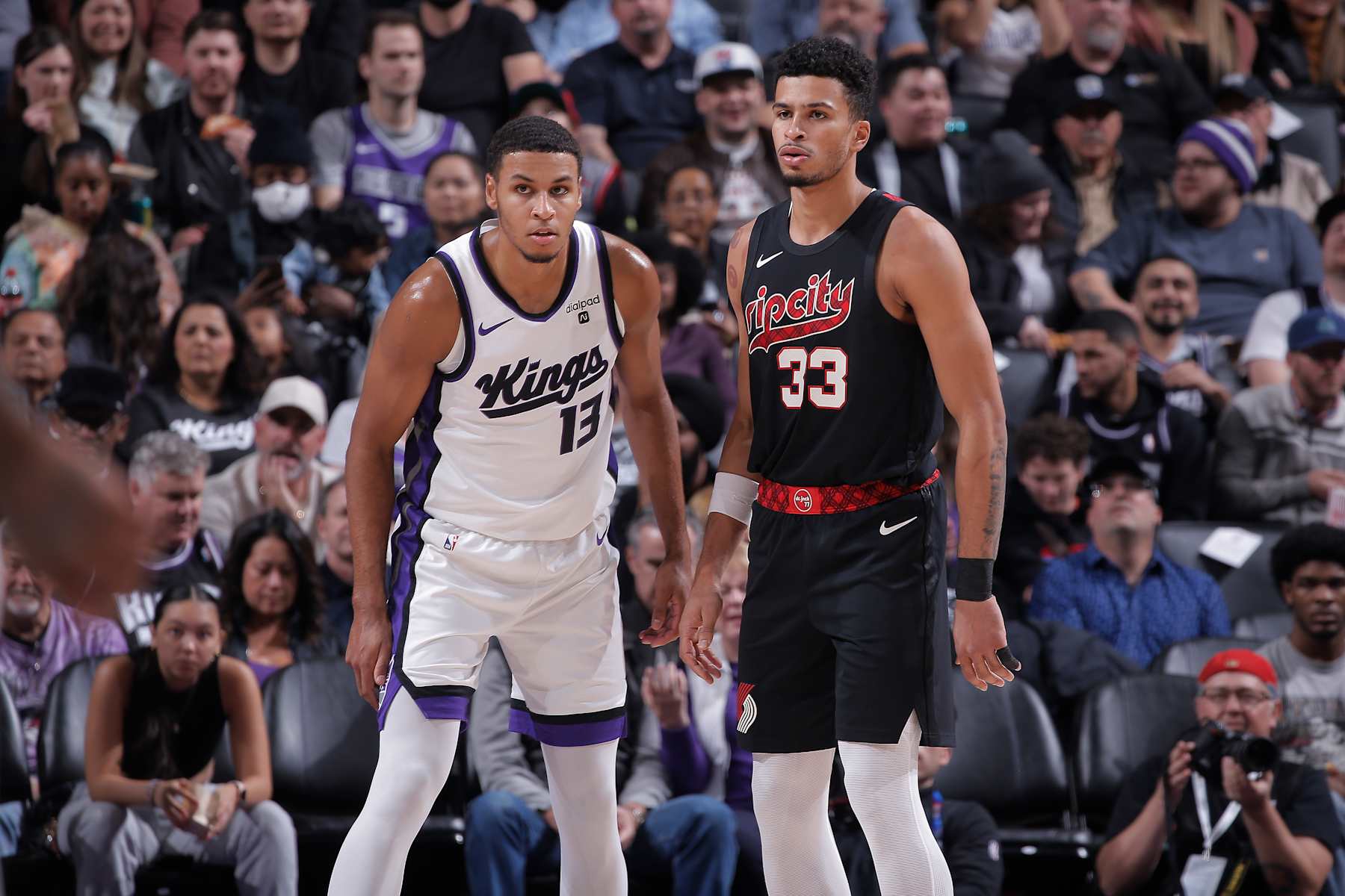SACRAMENTO, CA - NOVEMBER 8: Keegan Murray #13 of the Sacramento Kings and Toumani Camara #33 of the Portland Trail Blazers look on during the game on November 8, 2023 at Golden 1 Center in Sacramento, California. NOTE TO USER: User expressly acknowledges and agrees that, by downloading and or using this photograph, User is consenting to the terms and conditions of the Getty Images Agreement. Mandatory Copyright Notice: Copyright 2023 NBAE (Photo by Rocky Widner/NBAE via Getty Images)