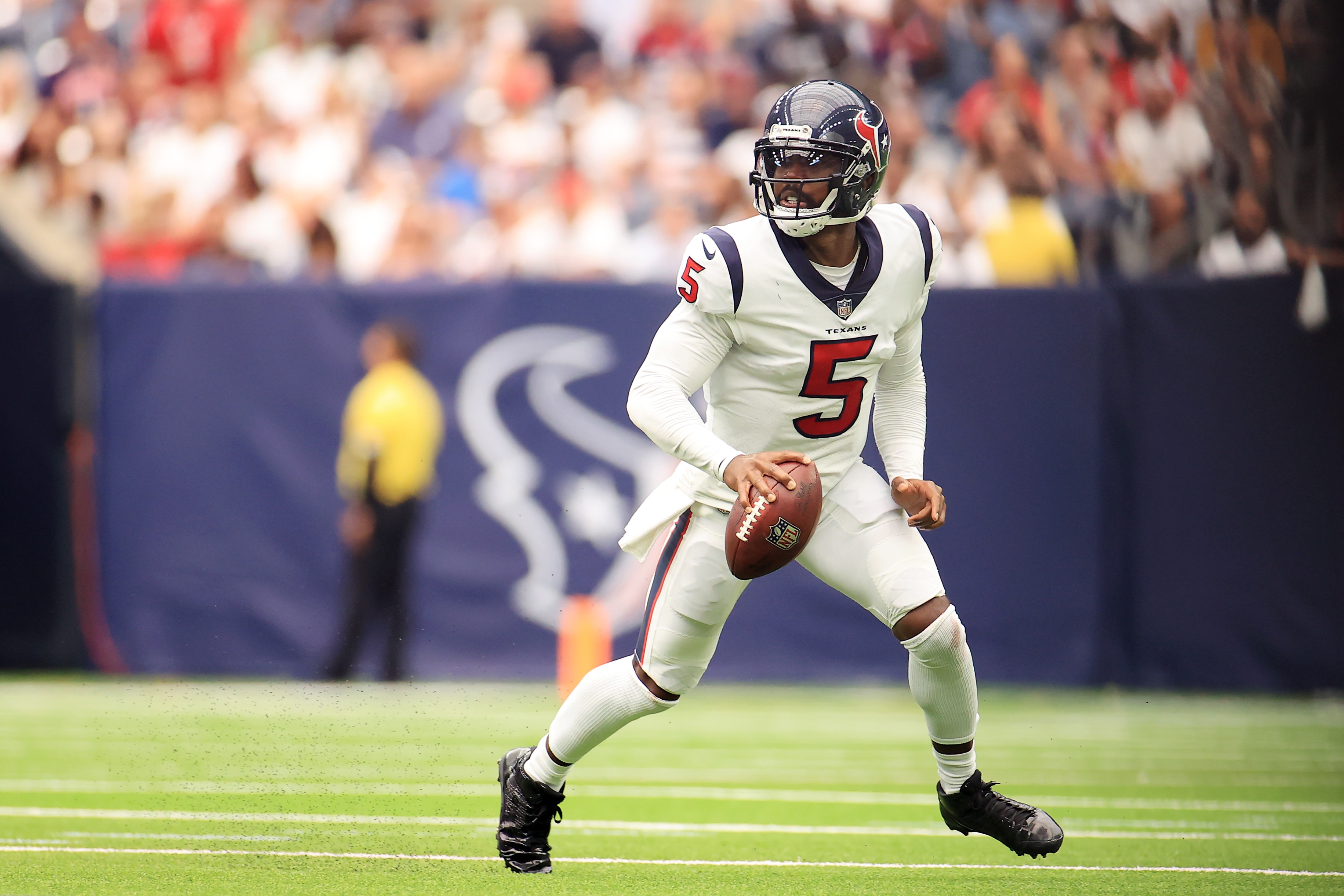 HOUSTON, TEXAS - SEPTEMBER 12: Tyrod Taylor #5 of the Houston Texans looks to pass during the second quarter against the Jacksonville Jaguars at NRG Stadium on September 12, 2021 in Houston, Texas. (Photo by Carmen Mandato/Getty Images)