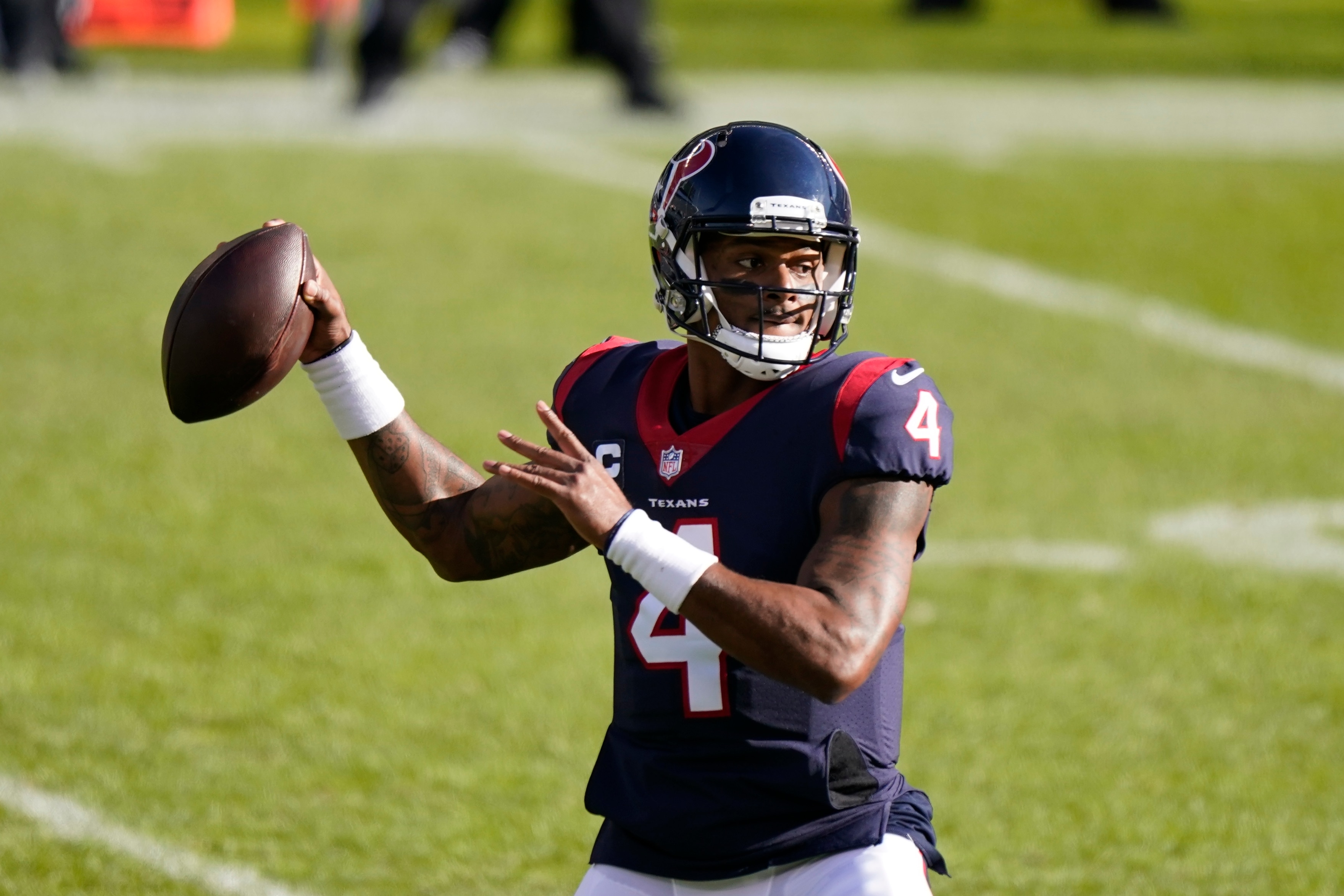 Houston Texans quarterback Deshaun Watson (4) throws during the first half of an NFL football game against the Chicago Bears, Sunday, Dec. 13, 2020, in Chicago. (AP Photo/Nam Y. Huh)