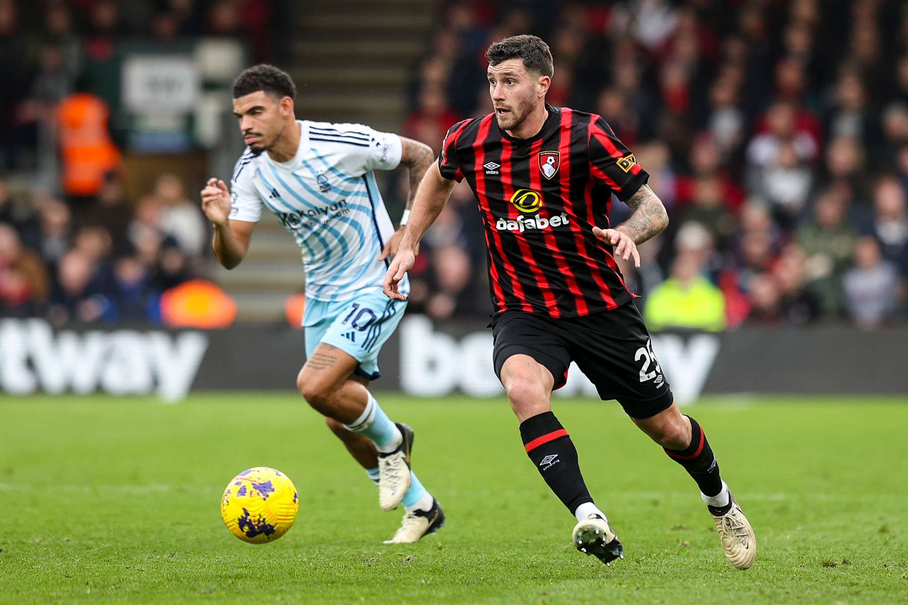BOURNEMOUTH, ENGLAND - FEBRUARY 04: Morgan Gibbs-White of Nottingham Forest and Marcos Senesi of Bournemouth during the Premier League match between AFC Bournemouth and Nottingham Forest at Vitality Stadium on February 04, 2024 in Bournemouth, England. (Photo by Robin Jones - AFC Bournemouth/AFC Bournemouth via Getty Images)