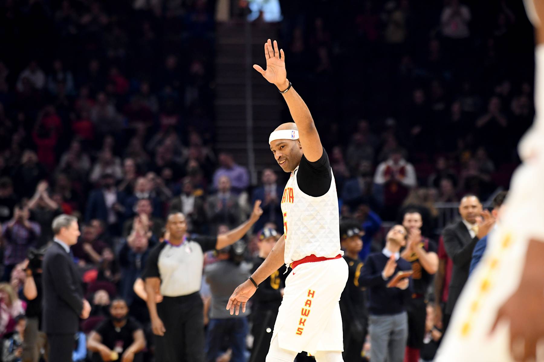 CLEVELAND, OHIO - FEBRUARY 12: Vince Carter #15 of the Atlanta Hawks reacts after being honored by the Cleveland Cavaliers during the first half at Rocket Mortgage Fieldhouse on February 12, 2020 in Cleveland, Ohio. NOTE TO USER: User expressly acknowledges and agrees that, by downloading and/or using this photograph, user is consenting to the terms and conditions of the Getty Images License Agreement. (Photo by Jason Miller/Getty Images)