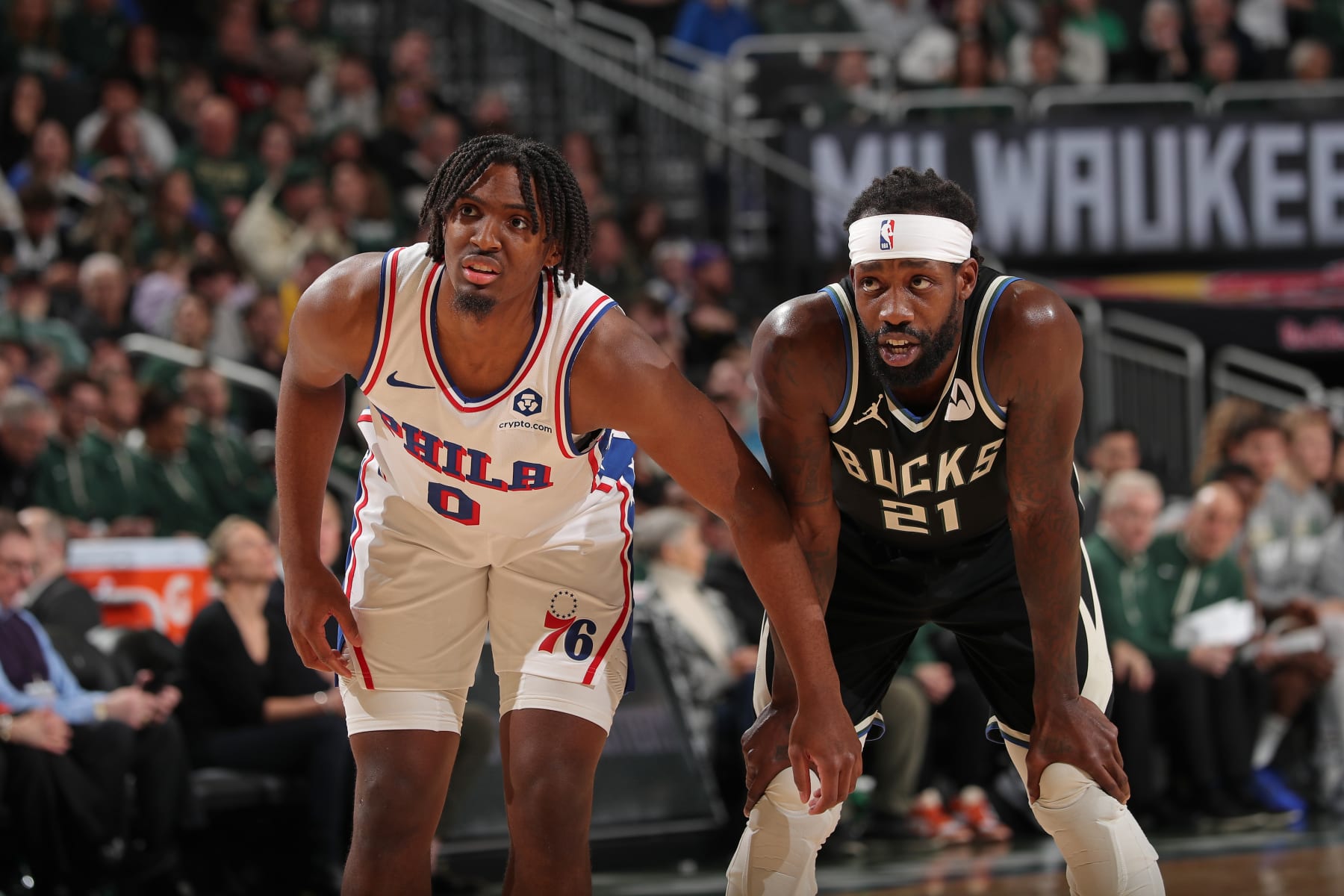 MILWAUKEE, WI - MARCH 14: Patrick Beverley #21 of the Milwaukee Bucks and Tyrese Maxey #0 of the Philadelphia 76ers look on during the game on March 14, 2024 at the Fiserv Forum Center in Milwaukee, Wisconsin. NOTE TO USER: User expressly acknowledges and agrees that, by downloading and or using this Photograph, user is consenting to the terms and conditions of the Getty Images License Agreement. Mandatory Copyright Notice: Copyright 2024 NBAE (Photo by Gary Dineen/NBAE via Getty Images).