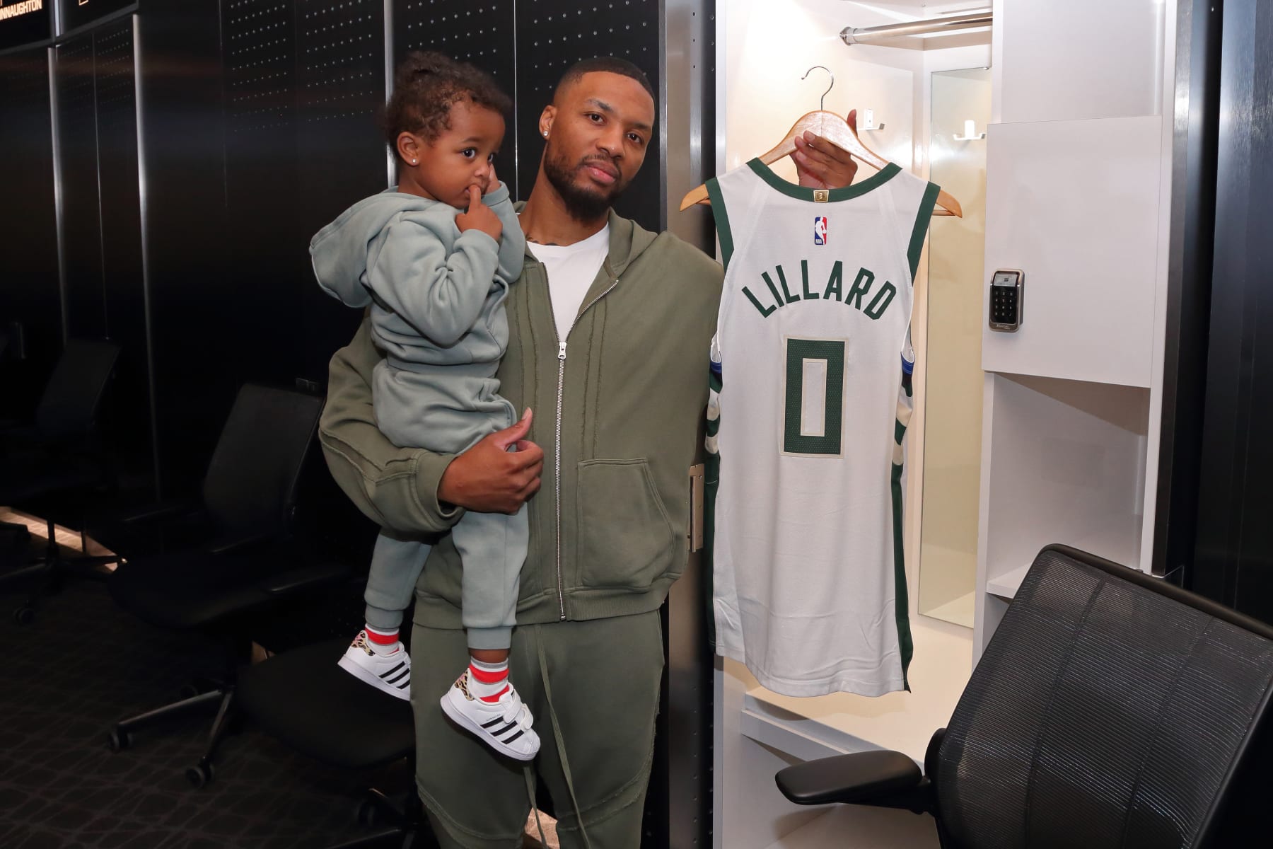 MILWAUKEE, WI - SEPTEMBER 30: Damian Lillard #0 of the Milwaukee Bucks arrives in Milwaukee to a welcome rally and tour on September 30, 2023 at Fiserv Forum in Milwaukee, Wisconsin. NOTE TO USER: User expressly acknowledges and agrees that, by downloading and or using this Photograph, user is consenting to the terms and conditions of the Getty Images License Agreement. Mandatory Copyright Notice: Copyright 2023 NBAE (Photo by Gary Dineen/NBAE via Getty Images)