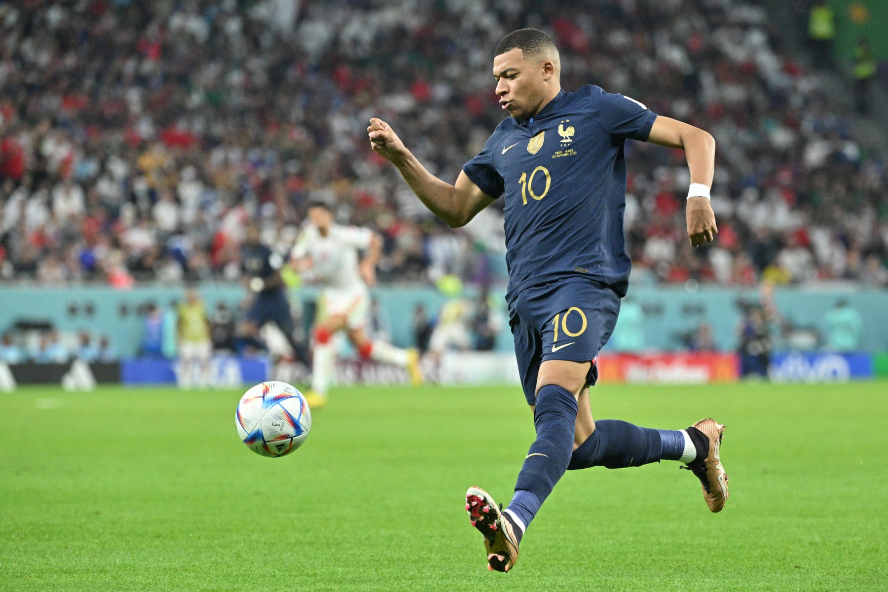 AL RAYYAN, QATAR - NOVEMBER 30: Kylian Mbappé of France in action during the FIFA World Cup Qatar 2022 Group D match between Tunisia and France at Education City Stadium on November 30, 2022 in Al Rayyan, Qatar. (Photo by Lionel Hahn/Getty Images)