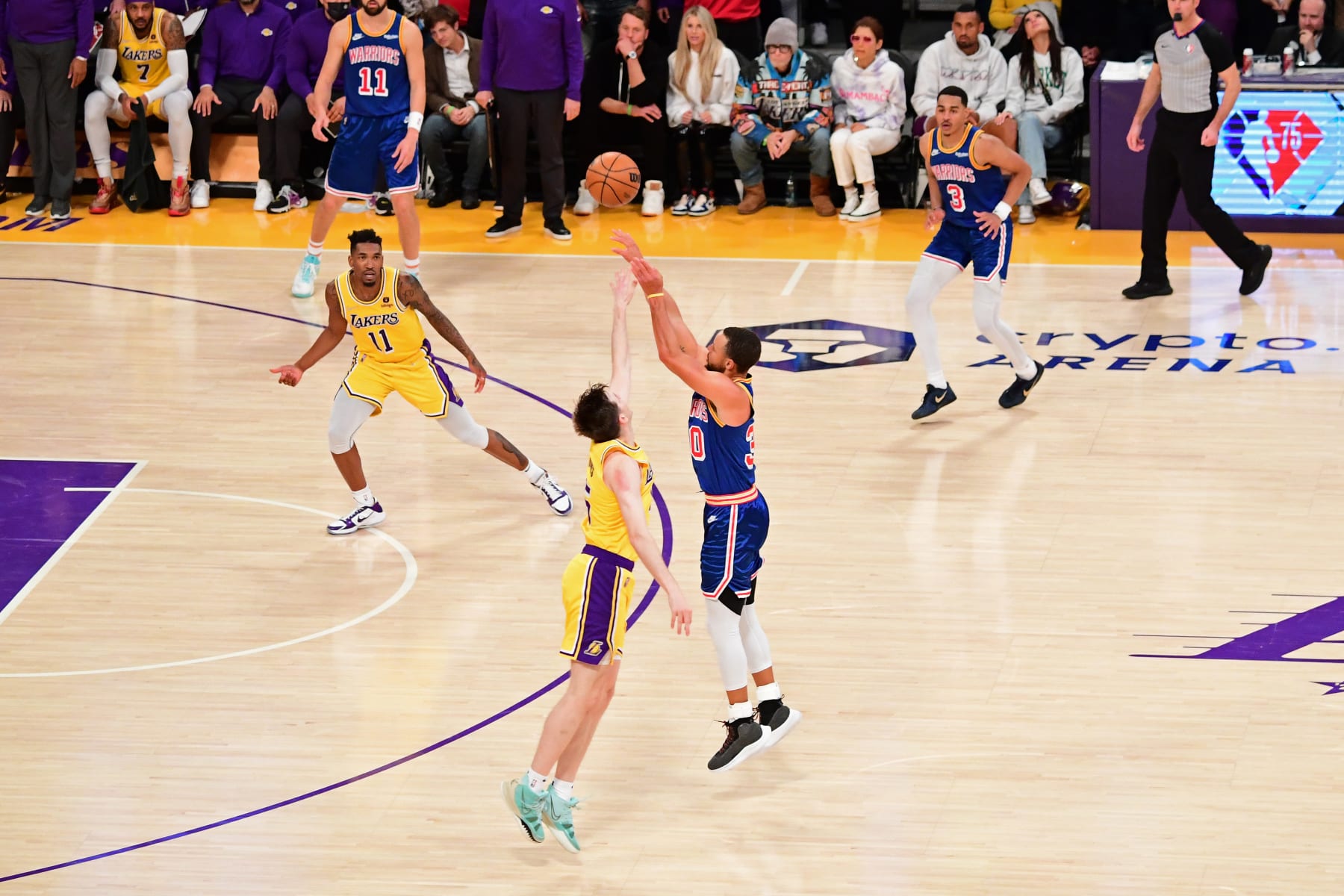 LOS ANGELES, CA - MARCH 5: Stephen Curry #30 of the Golden State Warriors shoots a three point basket during the game against the Los Angeles Lakers on March 5, 2022 at Crypto.Com Arena in Los Angeles, California. NOTE TO USER: User expressly acknowledges and agrees that, by downloading and/or using this Photograph, user is consenting to the terms and conditions of the Getty Images License Agreement. Mandatory Copyright Notice: Copyright 2022 NBAE (Photo by Adam Pantozzi/NBAE via Getty Images)