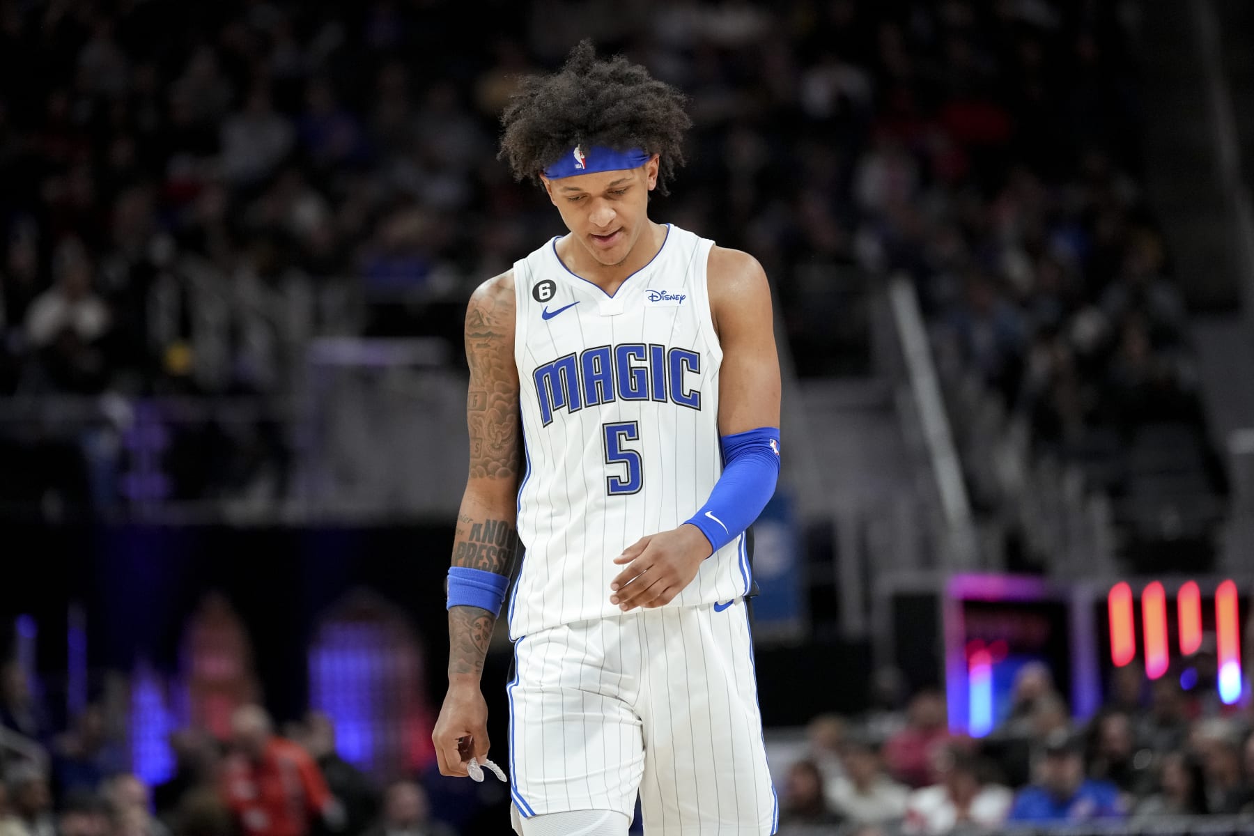 DETROIT, MICHIGAN - DECEMBER 28: Paolo Banchero #5 of the Orlando Magic looks down against the Detroit Pistons at Little Caesars Arena on December 28, 2022 in Detroit, Michigan. NOTE TO USER: User expressly acknowledges and agrees that, by downloading and or using this photograph, User is consenting to the terms and conditions of the Getty Images License Agreement. (Photo by Nic Antaya/Getty Images)