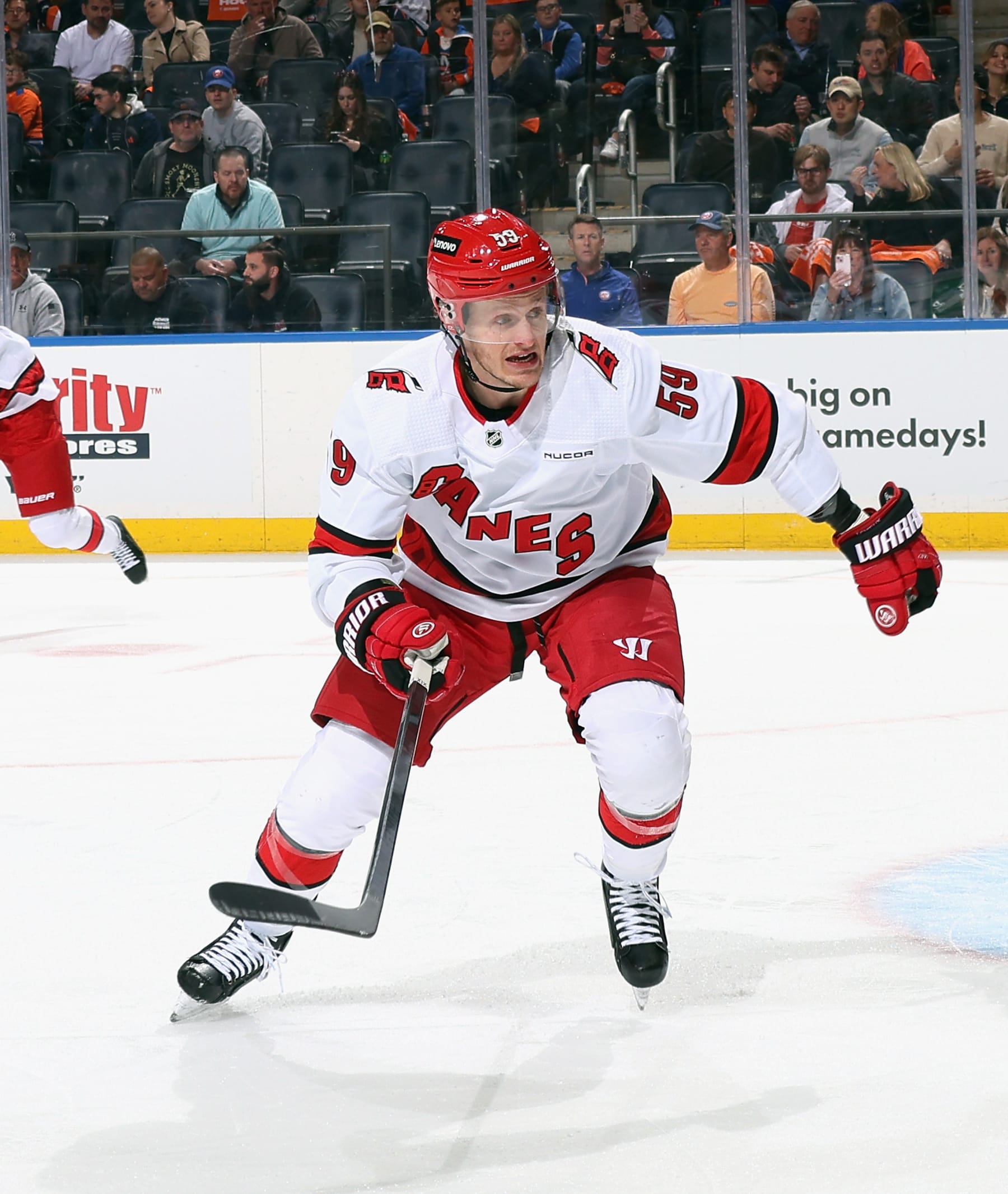 ELMONT, NEW YORK - APRIL 27: Jake Guentzel #59 of the Carolina Hurricanes skates against the New York Islanders in Game Four of the First Round of the 2024 Stanley Cup Playoffs at UBS Arena on April 27, 2024 in Elmont, New York. (Photo by Bruce Bennett/Getty Images)
