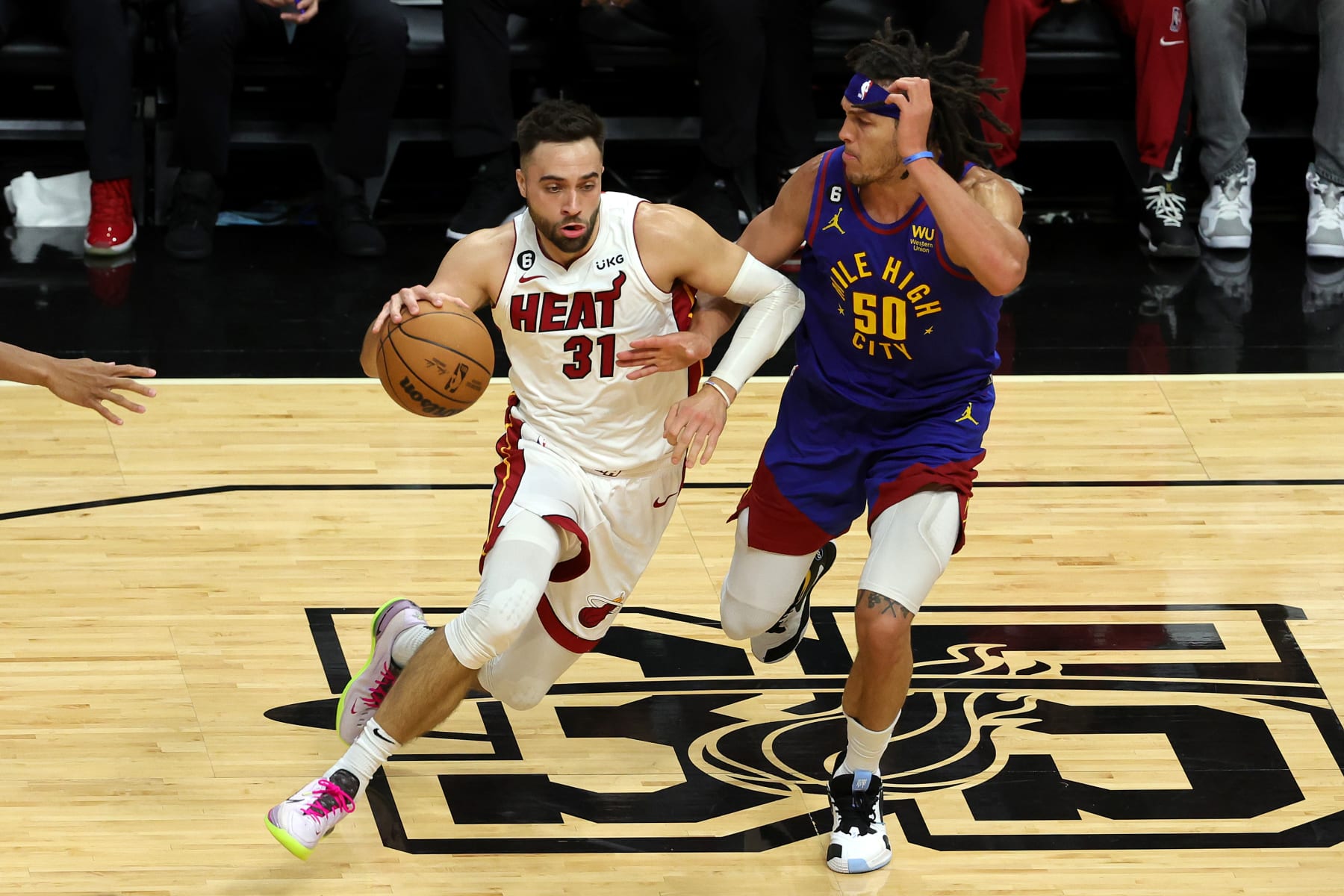 MIAMI, FLORIDA - JUNE 07: Max Strus #31 of the Miami Heat drives against Aaron Gordon #50 of the Denver Nuggets during the first quarter in Game Three of the 2023 NBA Finals at Kaseya Center on June 07, 2023 in Miami, Florida. NOTE TO USER: User expressly acknowledges and agrees that, by downloading and or using this photograph, User is consenting to the terms and conditions of the Getty Images License Agreement. (Photo by Megan Briggs/Getty Images)