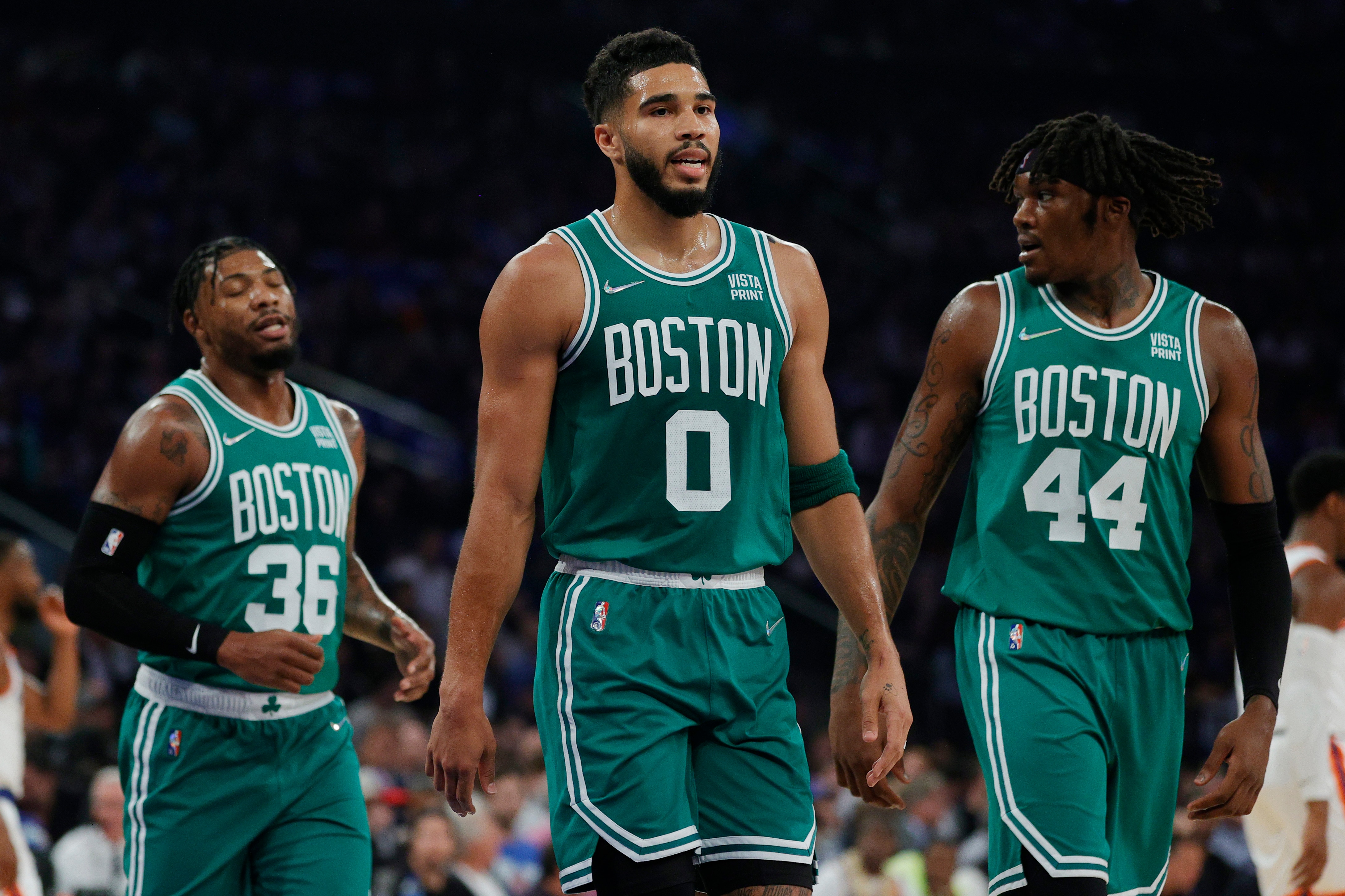 NEW YORK, NEW YORK - OCTOBER 20: Marcus Smart #36, Jayson Tatum #0, and Robert Williams III #44 of the Boston Celtics look on during the first half against the New York Knicks at Madison Square Garden on October 20, 2021 in New York City. NOTE TO USER: User expressly acknowledges and agrees that, by downloading and or using this photograph, User is consenting to the terms and conditions of the Getty Images License Agreement. (Photo by Sarah Stier/Getty Images)