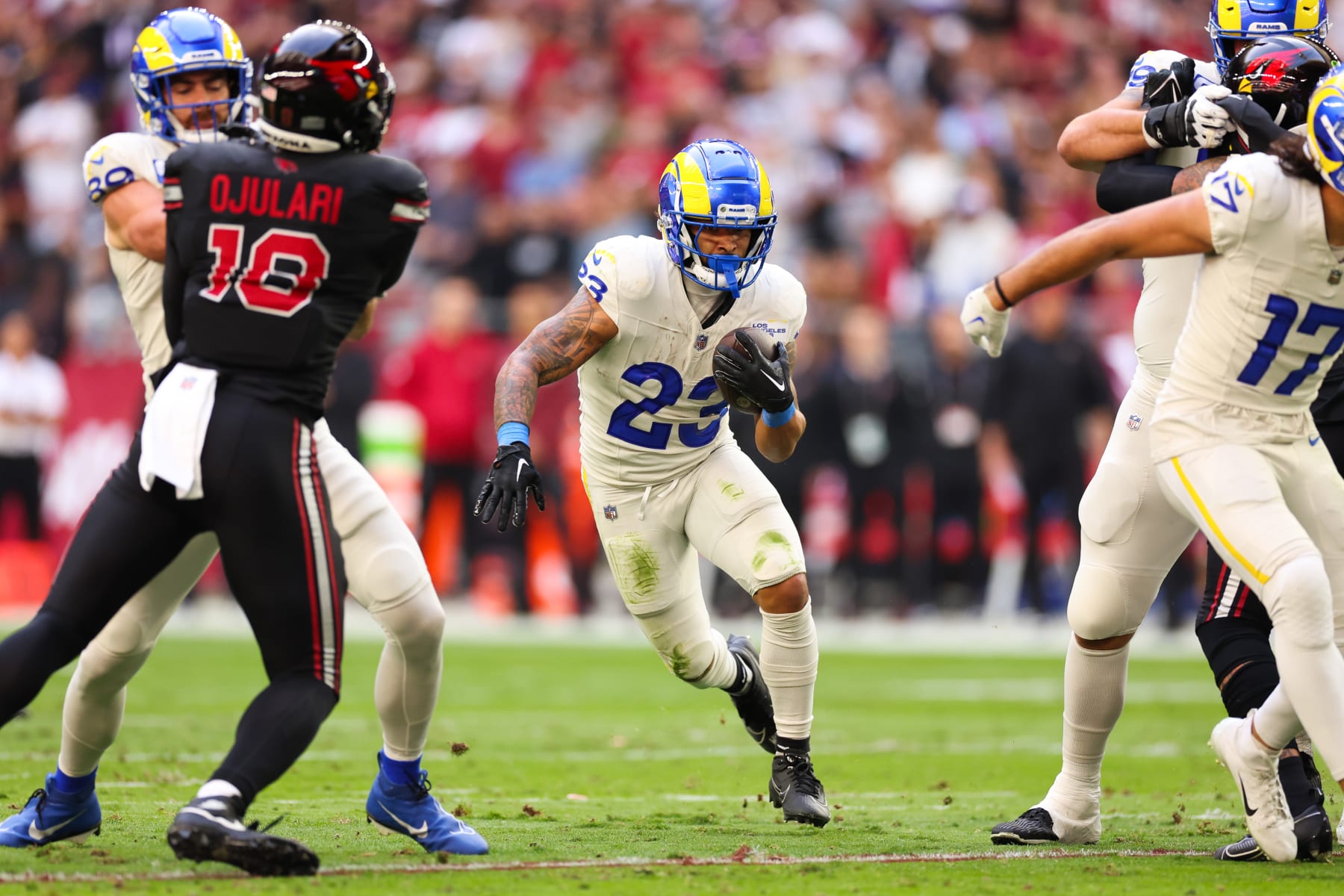 GLENDALE, ARIZONA - NOVEMBER 26: Kyren Williams #23 of the Los Angeles Rams runs the ball during the first quarter against the Arizona Cardinals at State Farm Stadium on November 26, 2023 in Glendale, Arizona. (Photo by Christian Petersen/Getty Images)