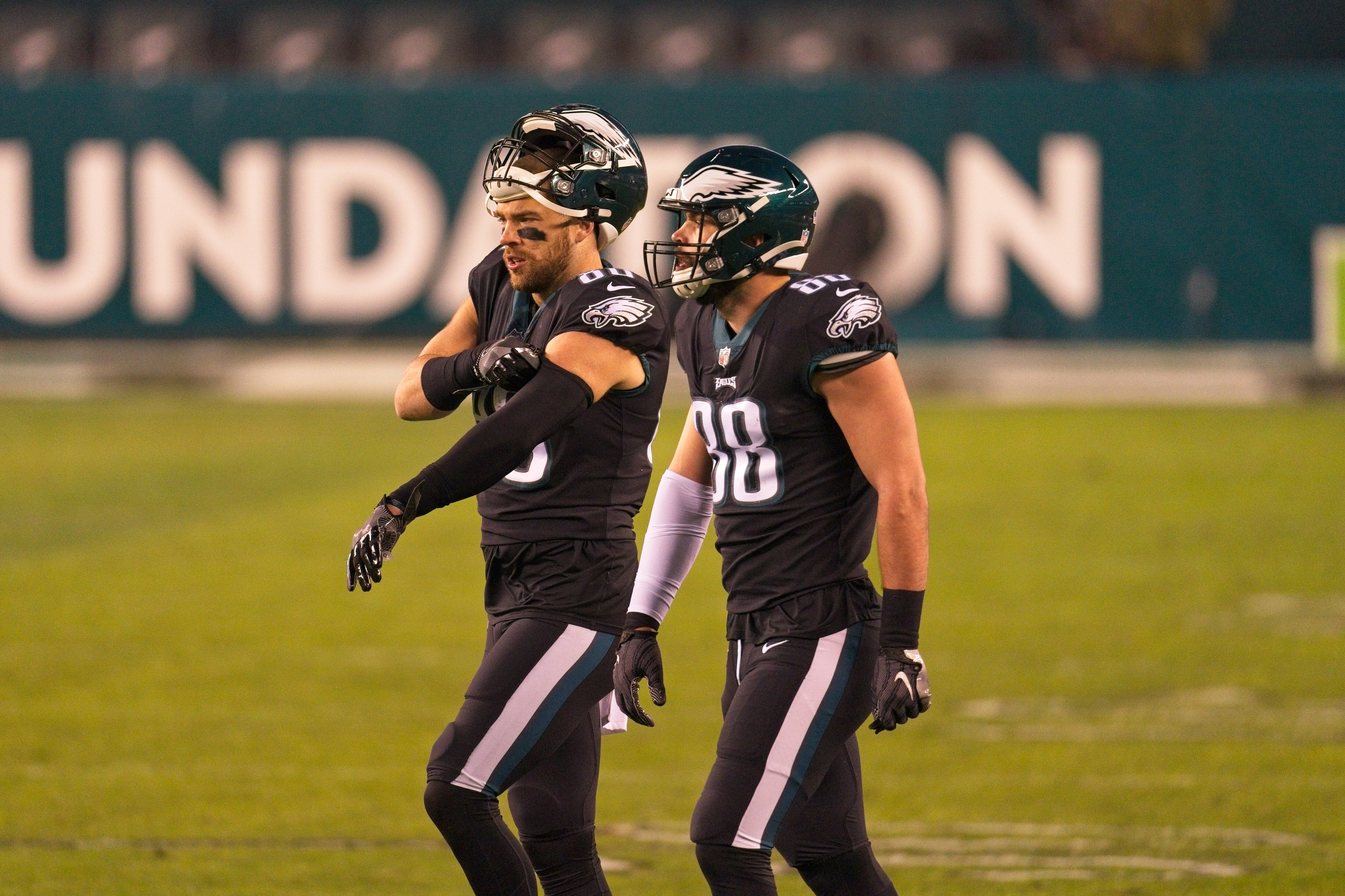 PHILADELPHIA, PA - DECEMBER 13: Philadelphia Eagles tight end Zach Ertz (86) and Philadelphia Eagles tight end Dallas Goedert (88) head to the huddle during the game between the New Orleans Saints and the Philadelphia Eagles on December 13, 2020 at Lincoln Financial Field in Philadelphia, PA. (Photo by Andy Lewis/Icon Sportswire via Getty Images)