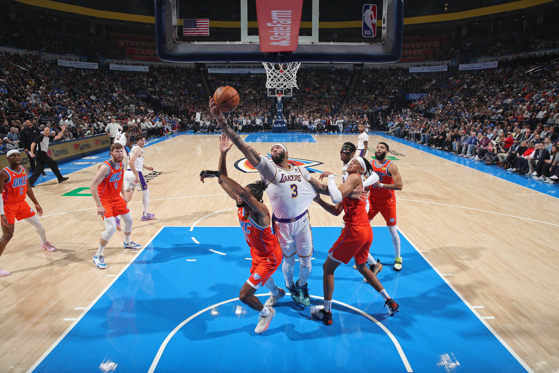OKLAHOMA CITY, OK - DECEMBER 23: Anthony Davis #3 of the Los Angeles Lakers rebounds during the game against the Oklahoma City Thunder on December 23, 2023 at Paycom Arena in Oklahoma City, Oklahoma. NOTE TO USER: User expressly acknowledges and agrees that, by downloading and or using this photograph, User is consenting to the terms and conditions of the Getty Images License Agreement. Mandatory Copyright Notice: Copyright 2023 NBAE (Photo by Zach Beeker/NBAE via Getty Images)