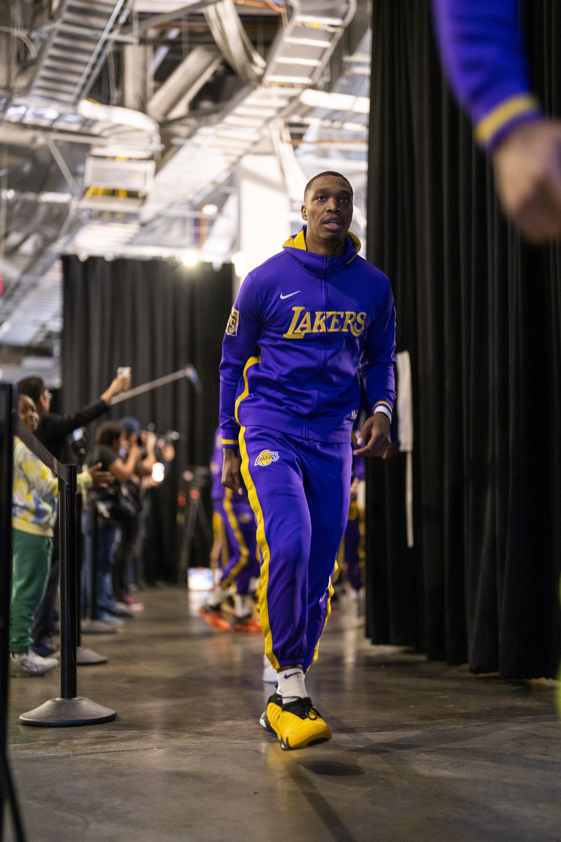 SAN FRANCISCO, CA - MAY 10: Lonnie Walker IV #4 of the Los Angeles Lakers walks through the arena before Game 5 of the Western Conference Semi-Finals of the 2023 NBA Playoffs against the Golden State Warriors on May 10, 2023 at Chase Center in San Francisco, California. NOTE TO USER: User expressly acknowledges and agrees that, by downloading and or using this photograph, user is consenting to the terms and conditions of Getty Images License Agreement. Mandatory Copyright Notice: Copyright 2023 NBAE (Photo by Tyler Ross/NBAE via Getty Images)