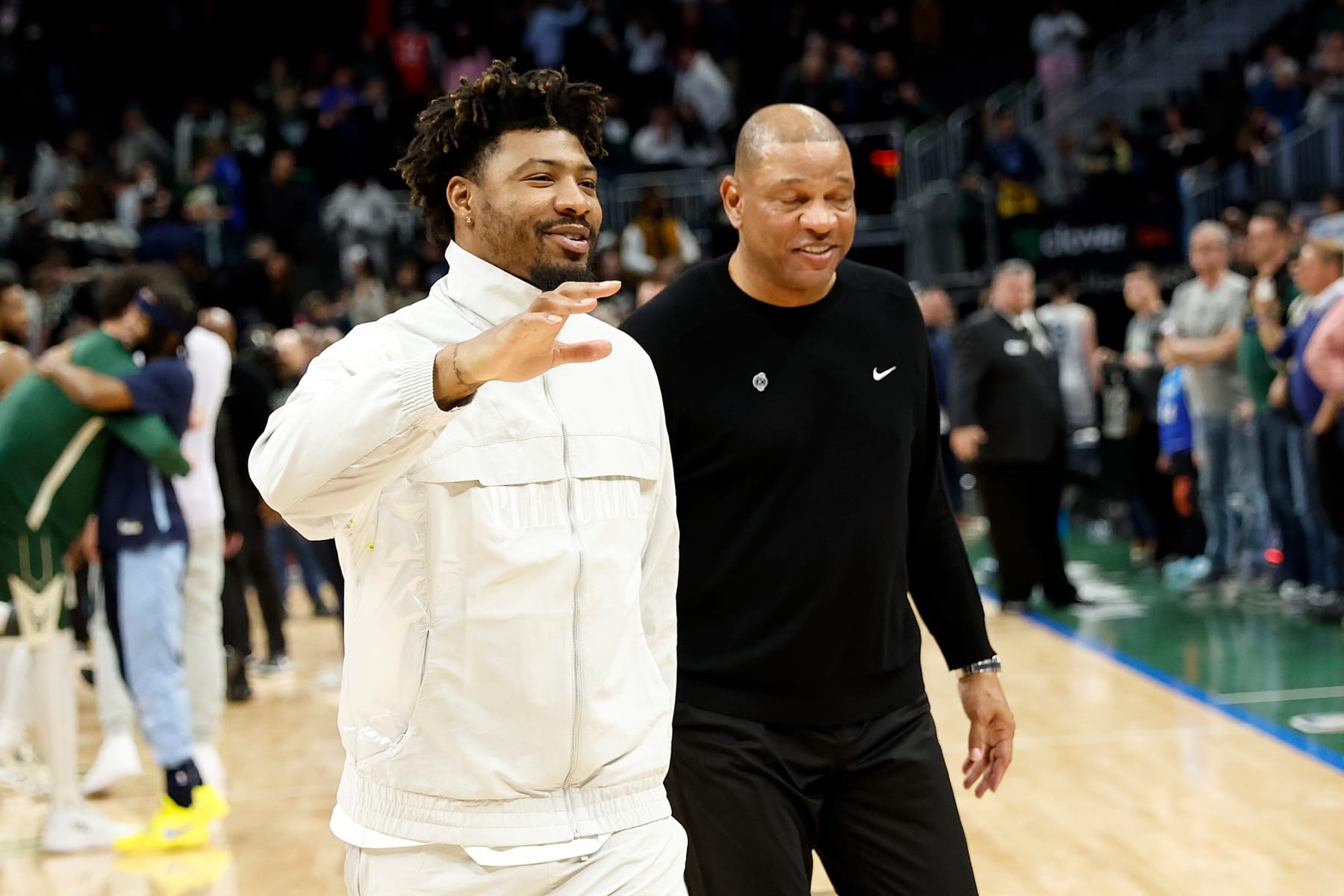 MILWAUKEE, WISCONSIN - APRIL 03: Marcus Smart of the Memphis Grizzlies reacts after the win over the Milwaukee Bucks at Fiserv Forum on April 03, 2024 in Milwaukee, Wisconsin. NOTE TO USER: User expressly acknowledges and agrees that, by downloading and or using this photograph, User is consenting to the terms and conditions of the Getty Images License Agreement. (Photo by John Fisher/Getty Images)