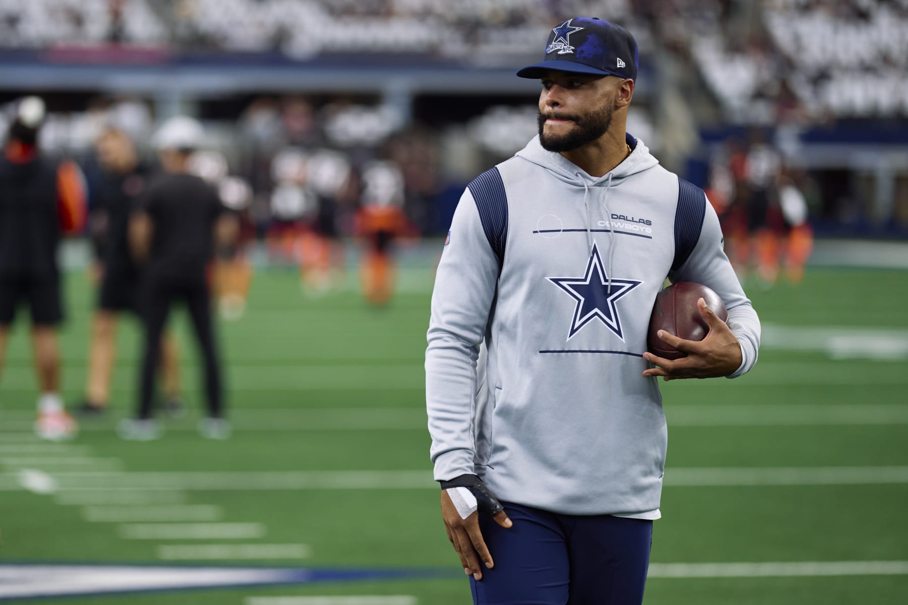ARLINGTON, TX - SEPTEMBER 18: Dak Prescott #4 of the Dallas Cowboys looks on before kickoff against the Cincinnati Bengals at AT&T Stadium on September 18, 2022 in Arlington, Texas. (Photo by Cooper Neill/Getty Images)
