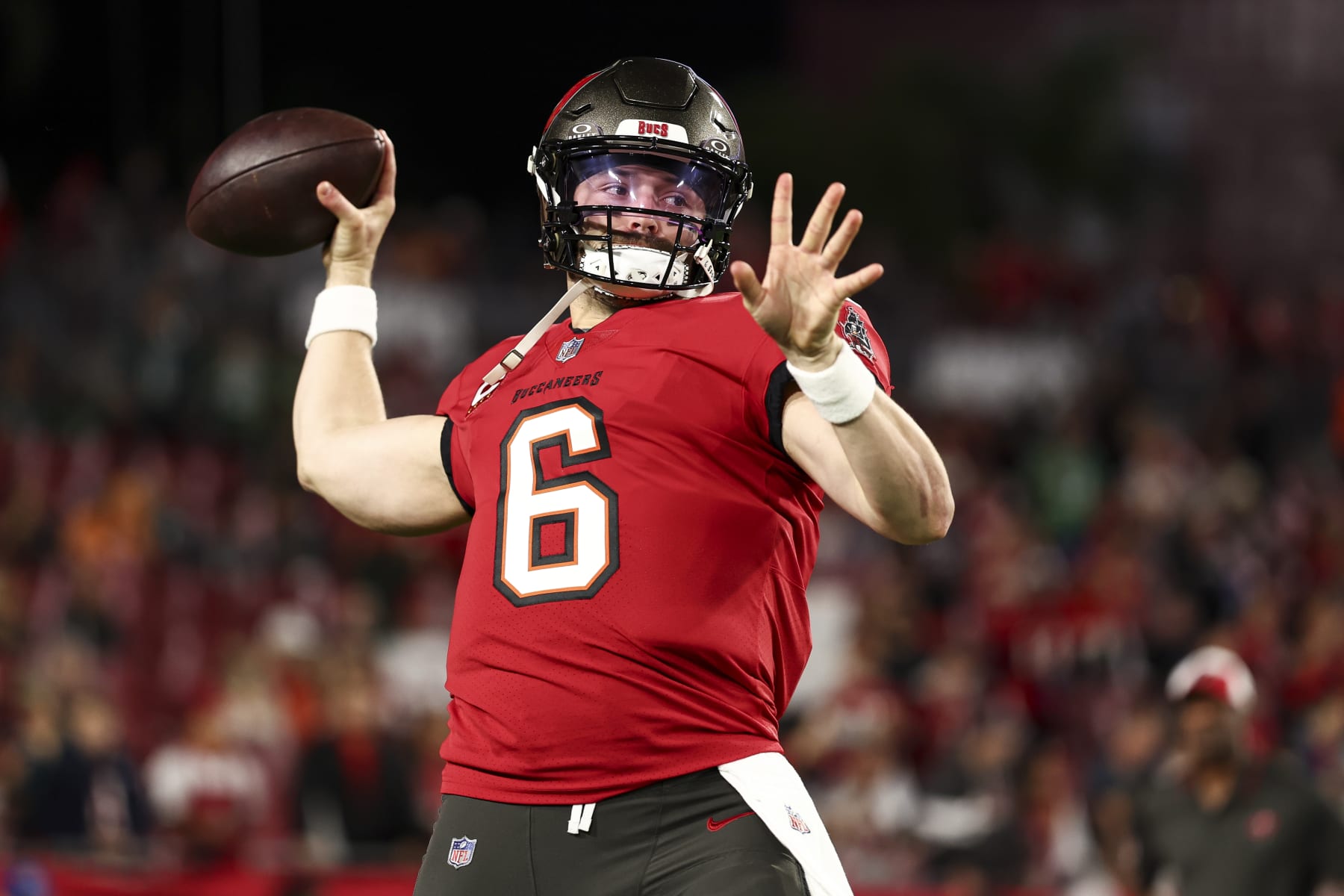 TAMPA, FL - JANUARY 15: Baker Mayfield #6 of the Tampa Bay Buccaneers warms up prior to an NFL wild-card playoff football game against the Philadelphia Eagles at Raymond James Stadium on January 15, 2024 in Tampa, Florida. (Photo by Kevin Sabitus/Getty Images)