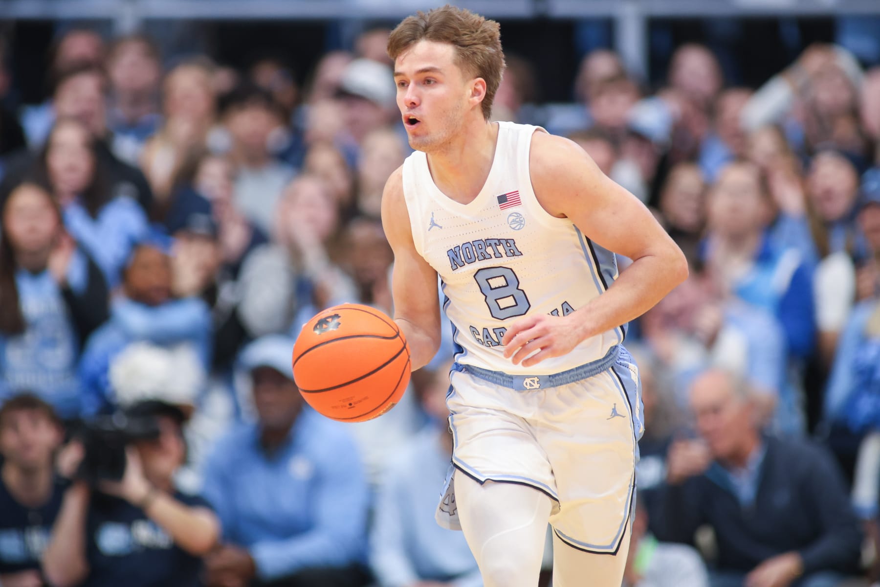 RALEIGH, NC - NOVEMBER 04: North Carolina Tar Heels guard Paxson Wojcik (8) brings the ball up court during the college football game between the North Carolina State Wolfpack and the Miami Hurricanes on November 4, 2023 at Carter-Finley Stadium in Raleigh, NC. (Photo by Nicholas Faulkner/Icon Sportswire via Getty Images)