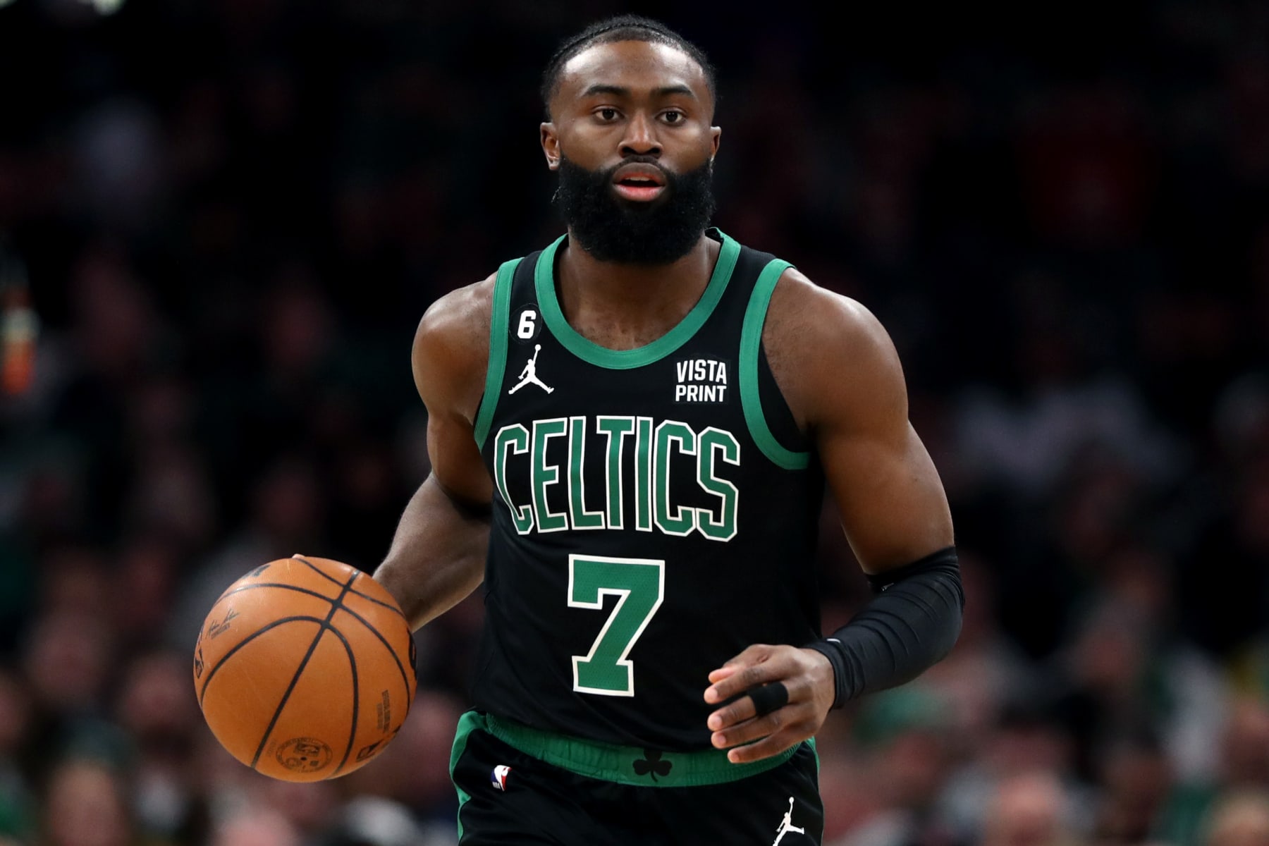 BOSTON, MASSACHUSETTS - FEBRUARY 03: Jaylen Brown #7 of the Boston Celtics dribbles downcourt at TD Garden on February 03, 2023 in Boston, Massachusetts. NOTE TO USER: User expressly acknowledges and agrees that, by downloading and or using this photograph, User is consenting to the terms and conditions of the Getty Images License Agreement. (Photo by Maddie Meyer/Getty Images)