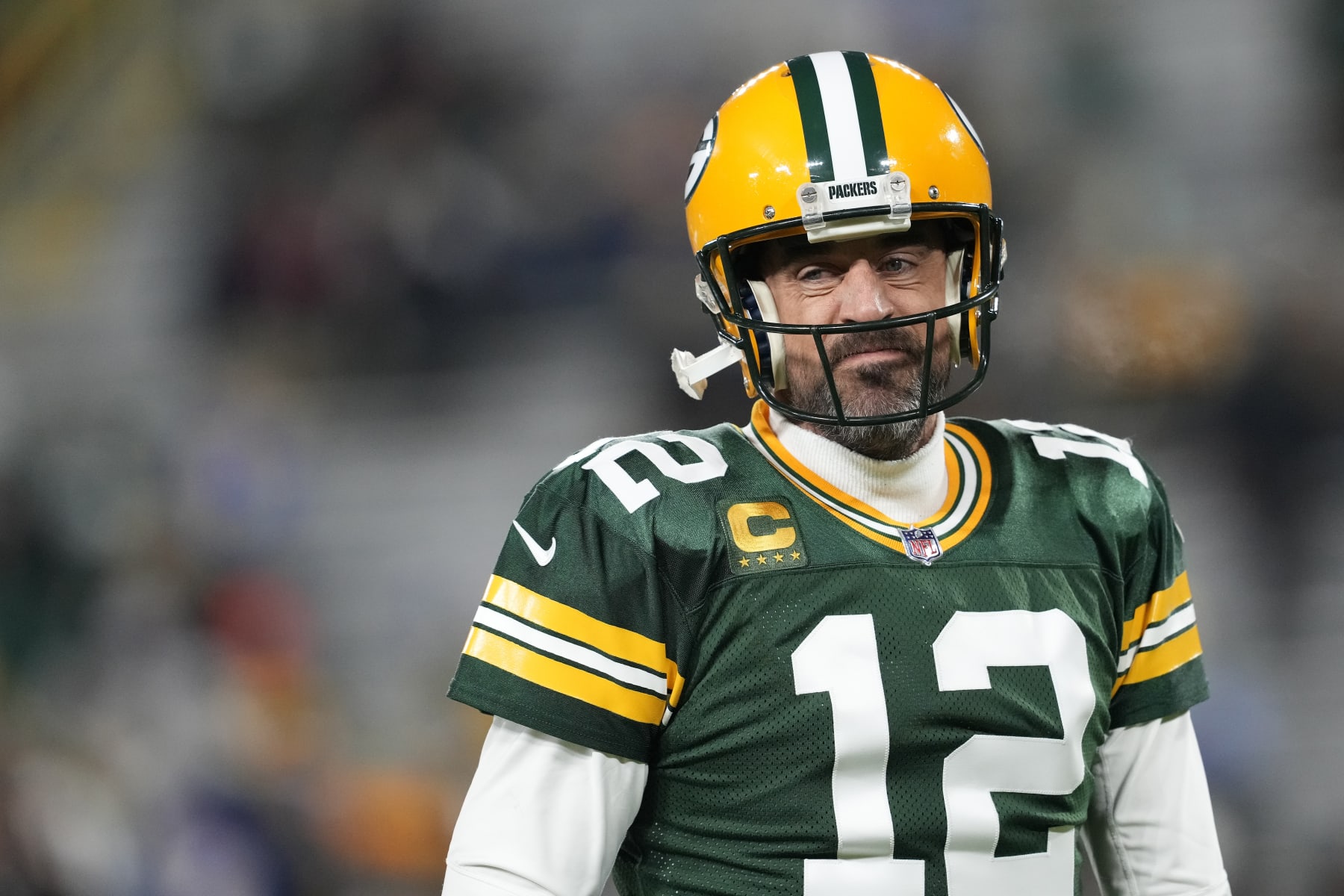 GREEN BAY, WISCONSIN - DECEMBER 19: Aaron Rodgers #12 of the Green Bay Packers warms up before a game against the Los Angeles Rams at Lambeau Field on December 19, 2022 in Green Bay, Wisconsin. (Photo by Patrick McDermott/Getty Images)