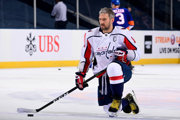 UNIONDALE, NEW YORK - APRIL 22: Alex Ovechkin #8 of the Washington Capitals skates during warm-ups prior to the game against the New York Islanders at Nassau Coliseum on April 22, 2021 in Uniondale, New York. (Photo by Steven Ryan/NHLI via Getty Images)