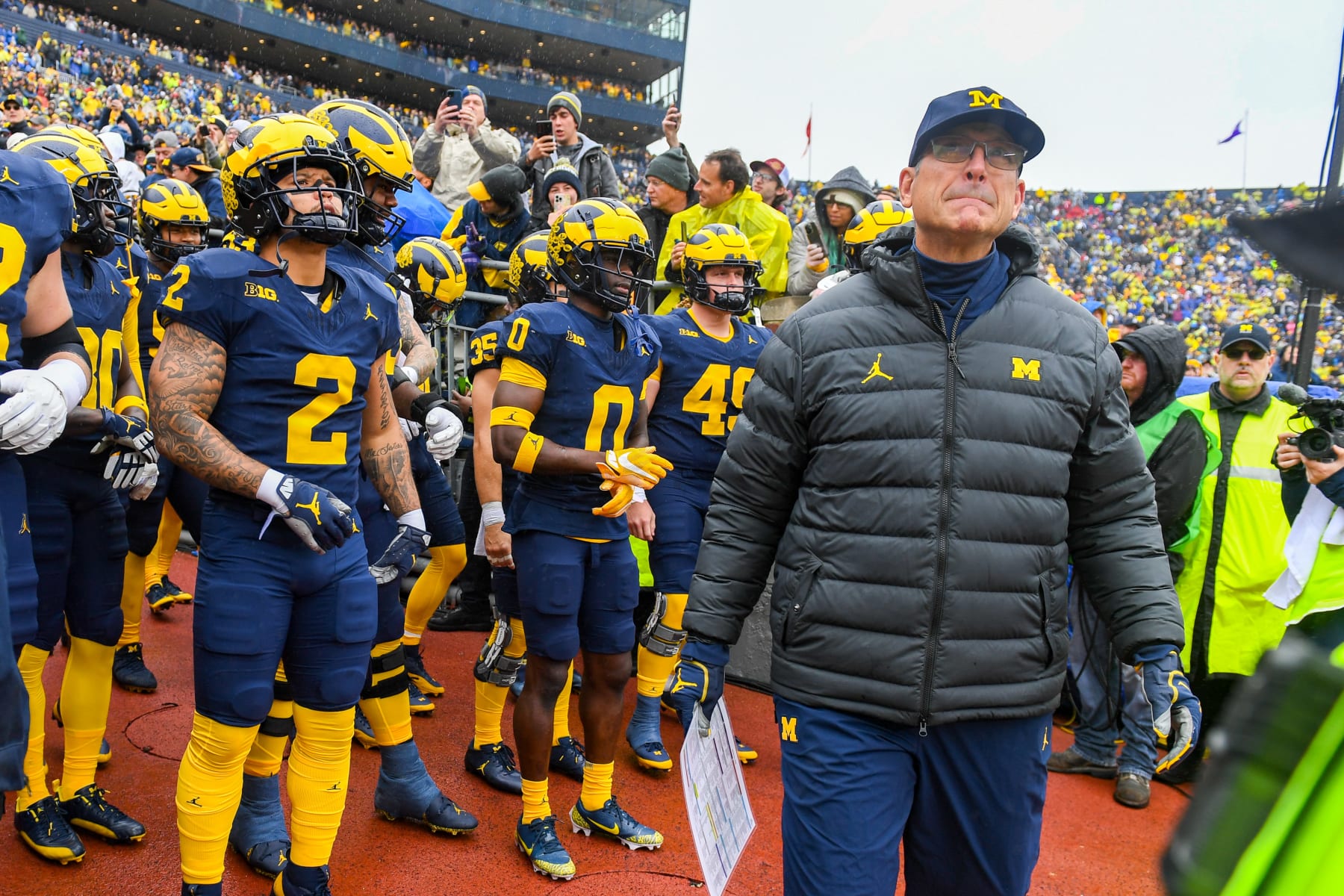 ANN ARBOR, MICHIGAN - OCTOBER 14: Head Coach Jim Harbaugh of the Michigan Wolverines prepares to lead his team onto the field before a game between the Michigan Wolverines and the Indiana Hoosiers at Michigan Stadium on October 14, 2023 in Ann Arbor, Michigan. (Photo by Aaron J. Thornton/Getty Images)