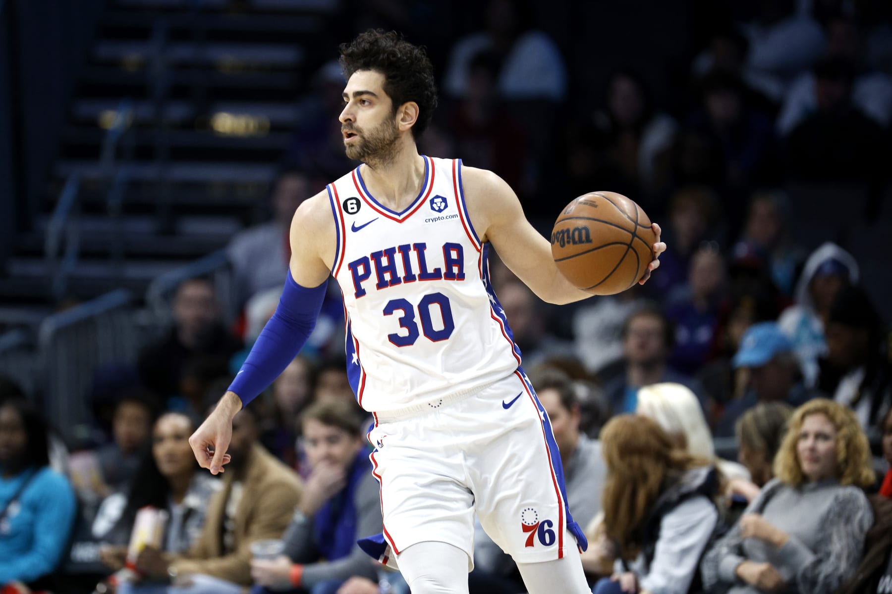 CHARLOTTE, NORTH CAROLINA - NOVEMBER 23: Furkan Korkmaz #30 of the Philadelphia 76ers dribbles during the first quarter of the game against the Charlotte Hornets at Spectrum Center on November 23, 2022 in Charlotte, North Carolina. NOTE TO USER: User expressly acknowledges and agrees that, by downloading and or using this photograph, User is consenting to the terms and conditions of the Getty Images License Agreement. (Photo by Jared C. Tilton/Getty Images)