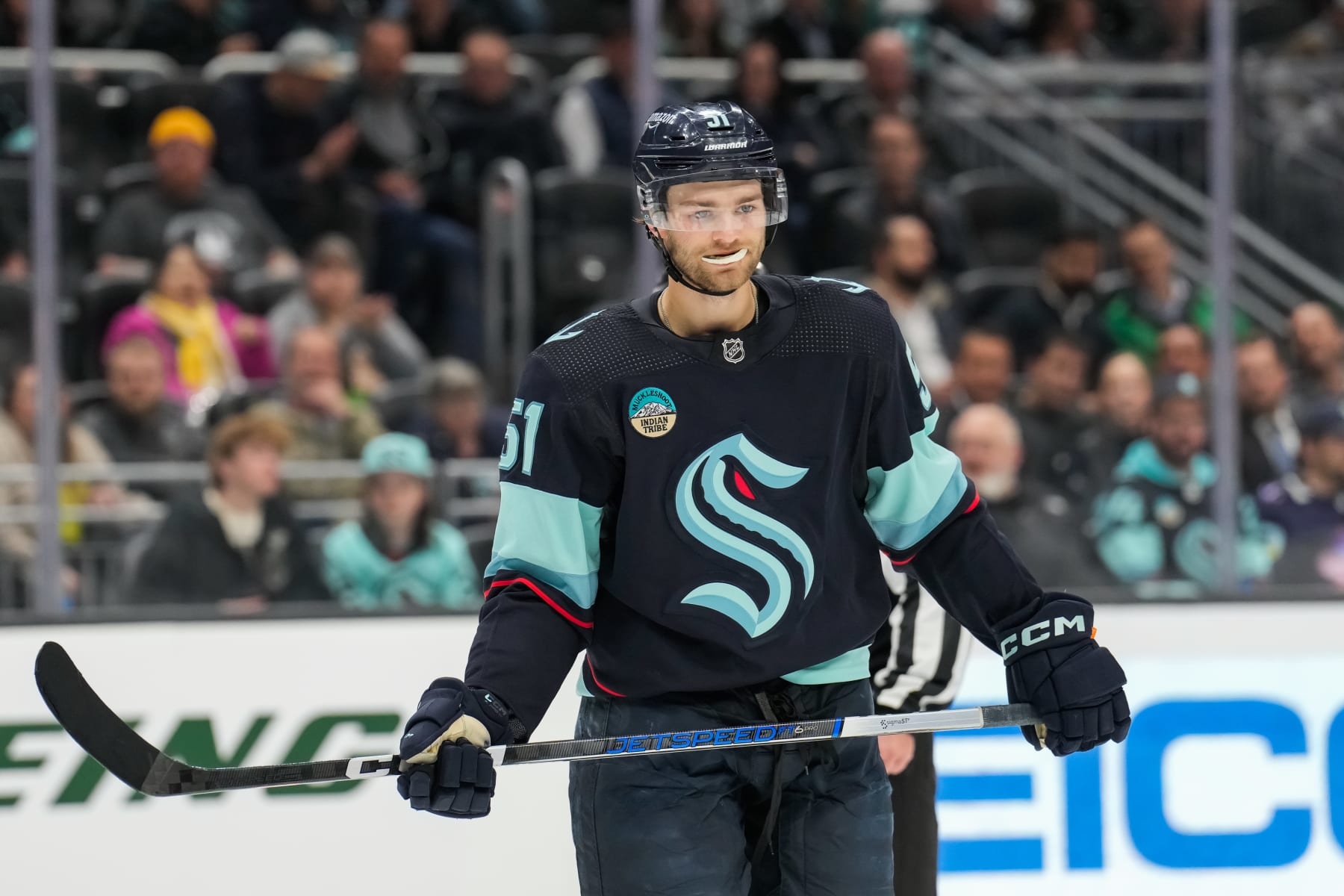 SEATTLE, WASHINGTON - APRIL 09: Shane Wright #51 of the Seattle Kraken looks on during the second period of a game against the Arizona Coyotes at Climate Pledge Arena on April 09, 2024 in Seattle, Washington. (Photo by Christopher Mast/NHLI via Getty Images)