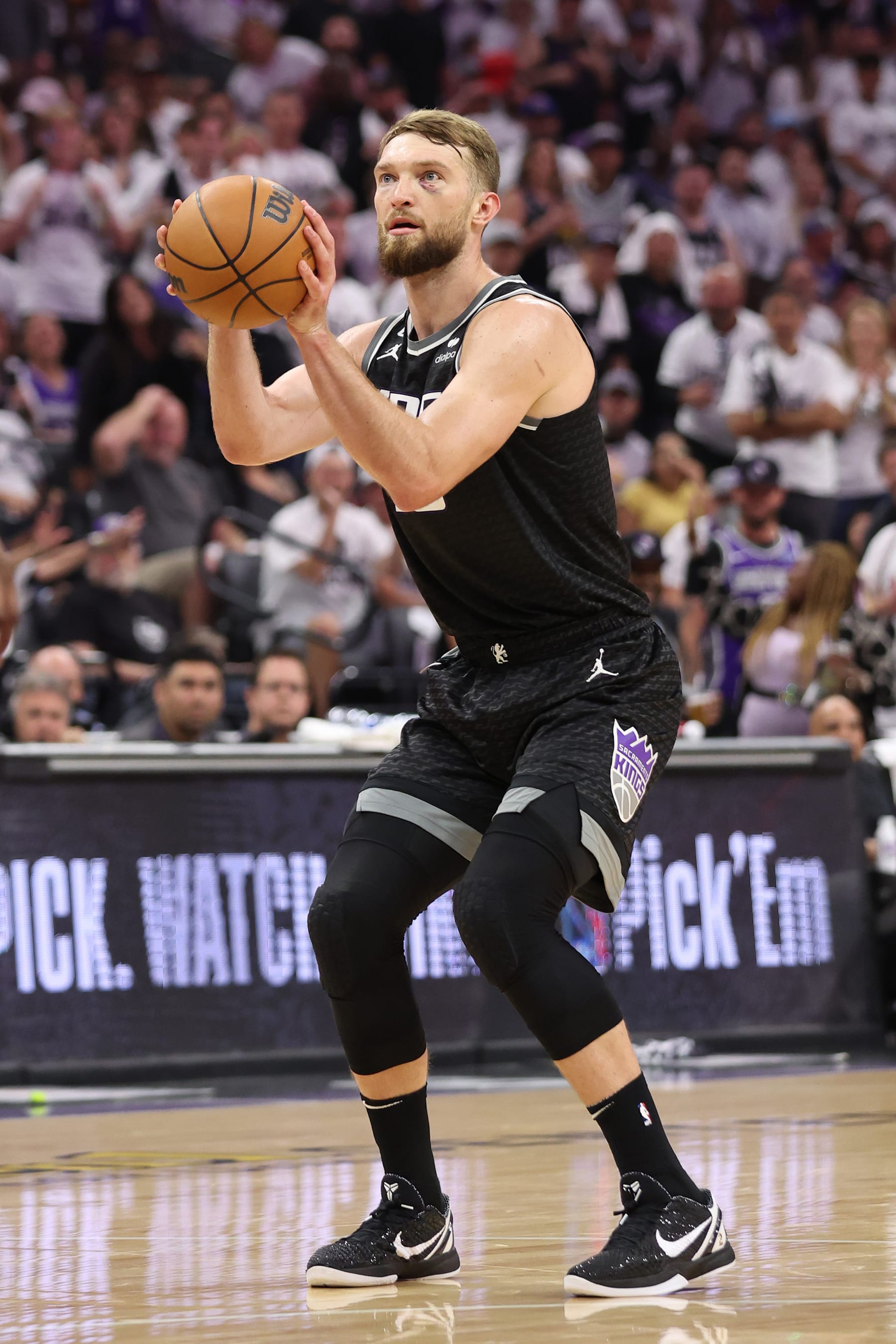 SACRAMENTO, CALIFORNIA - APRIL 30: Domantas Sabonis #10 of the Sacramento Kings shoots a free throw during the second quarter against the Golden State Warriors in game seven of the Western Conference First Round Playoffs at Golden 1 Center on April 30, 2023 in Sacramento, California. NOTE TO USER: User expressly acknowledges and agrees that, by downloading and or using this photograph, User is consenting to the terms and conditions of the Getty Images License Agreement. (Photo by Ezra Shaw/Getty Images)