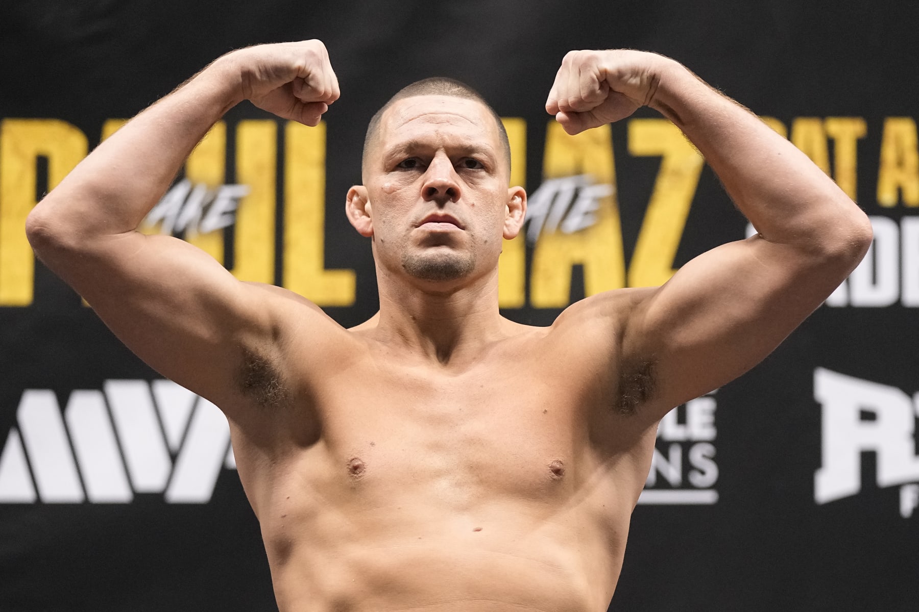 DALLAS, TEXAS - AUGUST 04: Nate Diaz gestures to the crowd during weigh-ins for his fight against Jake Paul at American Airlines Center on August 04, 2023 in Dallas, Texas. (Photo by Sam Hodde/Getty Images)