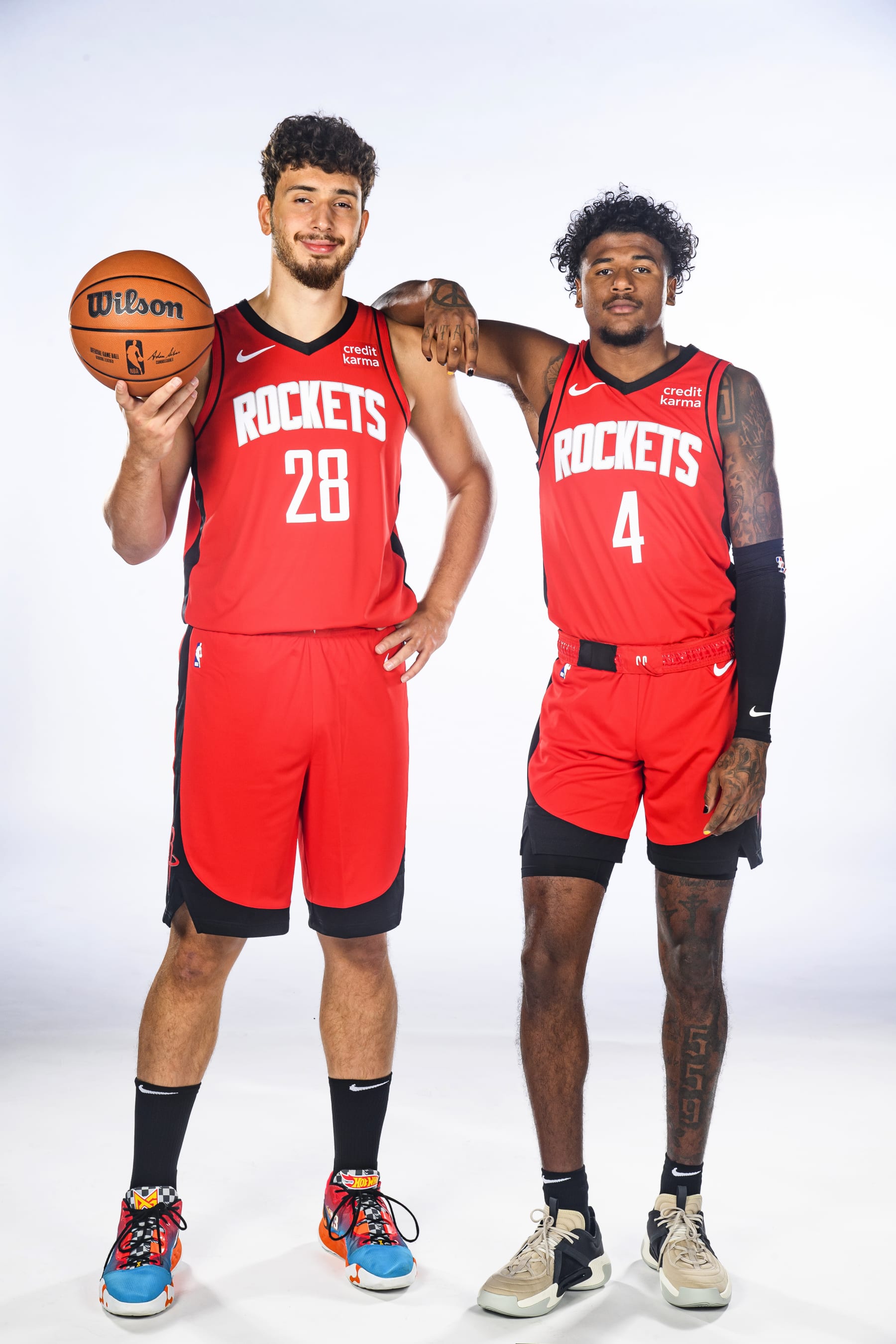 HOUSTON, TX - OCTOBER 02: Alperen Sengun #28 and Jalen Green #4 of the Houston Rockets poses for a portrait during 2023-24 NBA Media Day on October 2, 2023 at the Toyota Center in Houston, Texas. NOTE TO USER: User expressly acknowledges and agrees that, by downloading and or using this photograph, User is consenting to the terms and conditions of the Getty Images License Agreement. Mandatory Copyright Notice: Copyright 2023 NBAE (Photo by Logan Riely/NBAE via Getty Images)