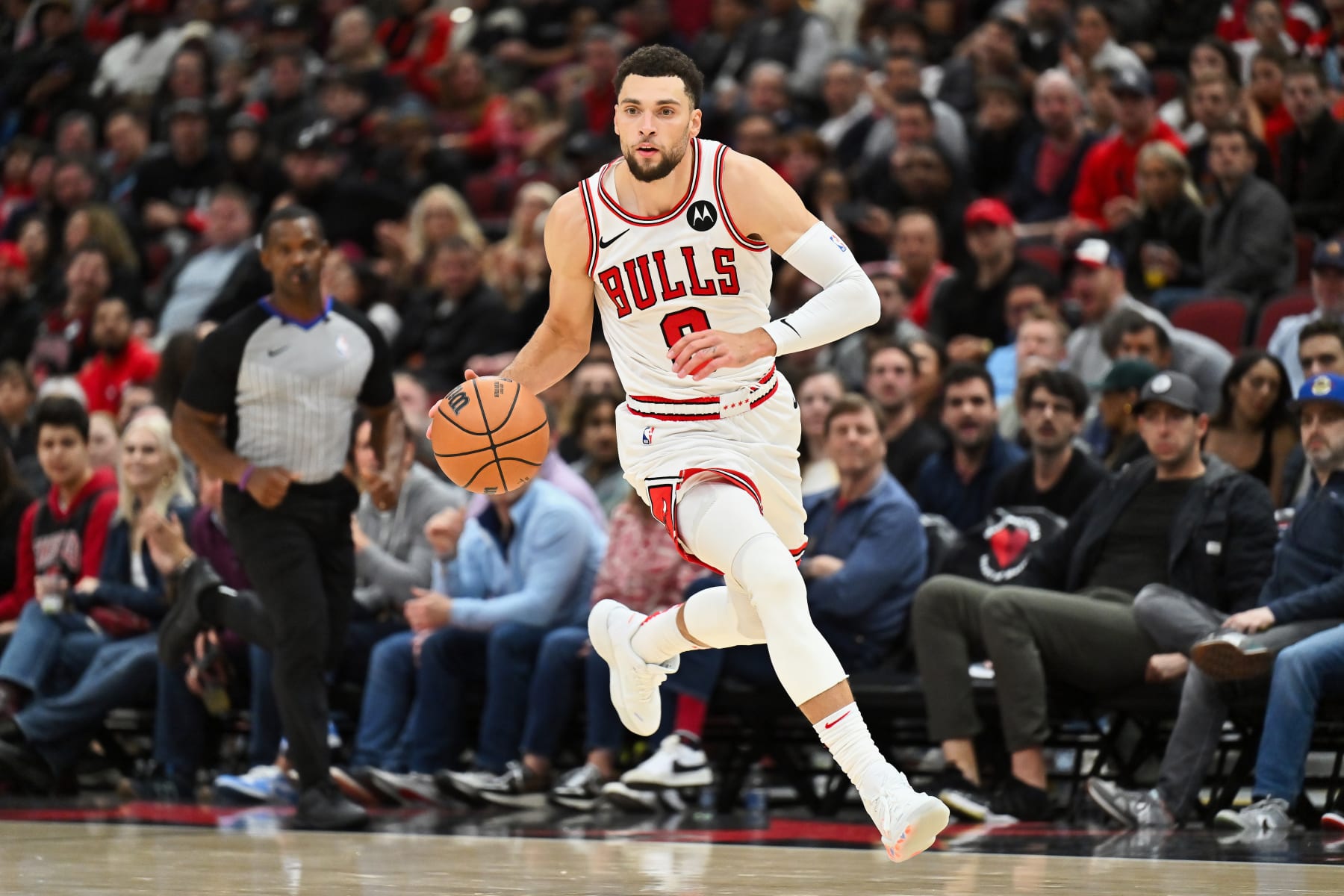 CHICAGO, ILLINOIS - NOVEMBER 15:  Zach Lavine #8 of the Chicago Bulls controls the ball against the Orlando Magic on November 15, 2023 at United Center in Chicago, Illinois.   NOTE TO USER: User expressly acknowledges and agrees that, by downloading and or using this photograph, User is consenting to the terms and conditions of the Getty Images License Agreement.  (Photo by Jamie Sabau/Getty Images)