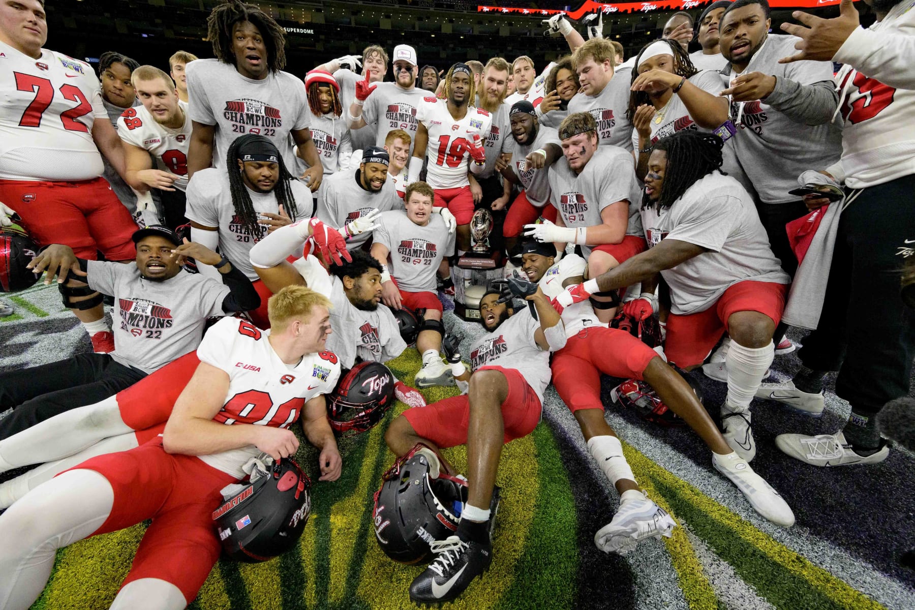 Western Kentucky players celebrate their team's victory over South Alabama during the New Orleans Bowl NCAA football game in New Orleans, Wednesday, Dec. 21, 2022. (AP Photo/Matthew Hinton)