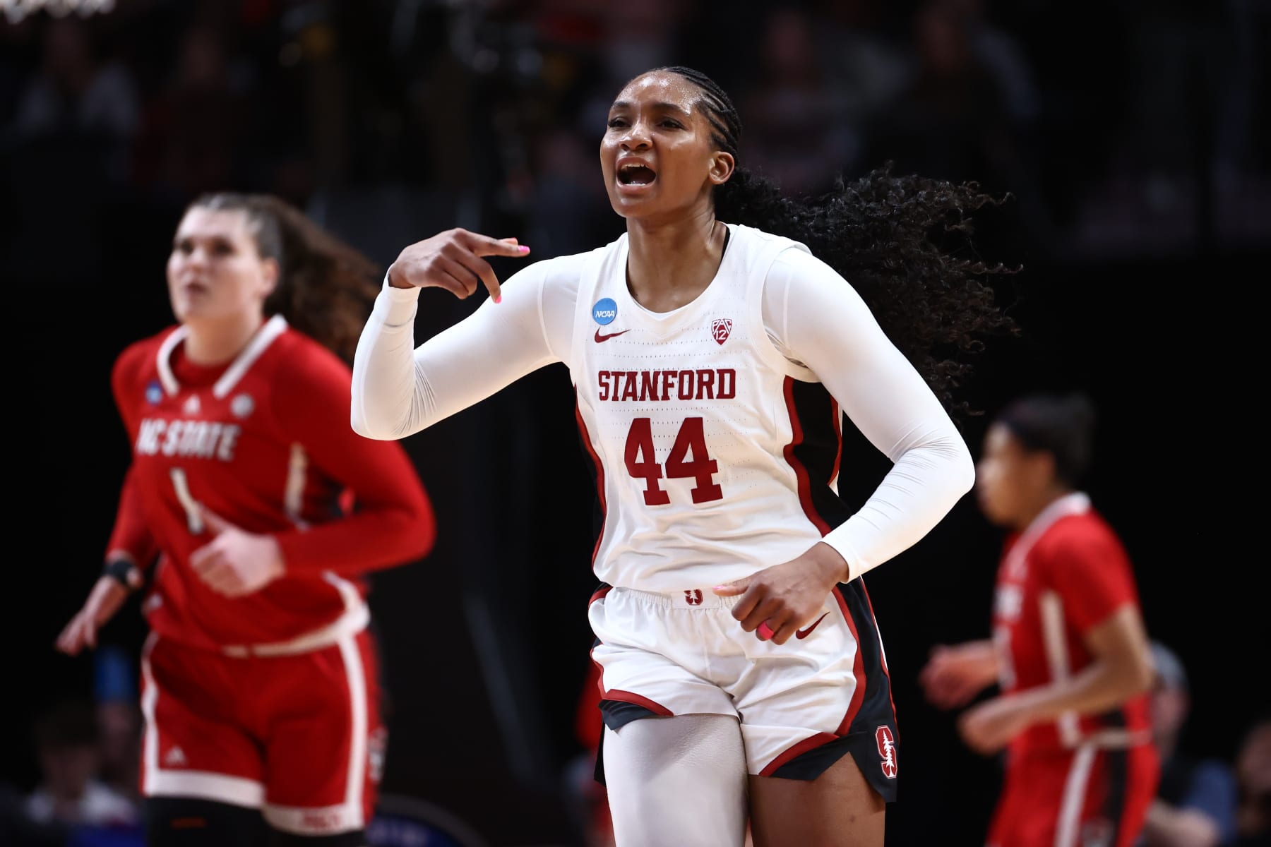 PORTLAND, OREGON - MARCH 29: Kiki Iriafen #44 of the Stanford Cardinal yells after making a three-point basket during the Sweet Sixteen round of the 2024 NCAA Women's Basketball Tournament held at the Moda Center on March 29, 2024 in Portland, Oregon. (Photo by Tyler Schank/NCAA Photos via Getty Images)