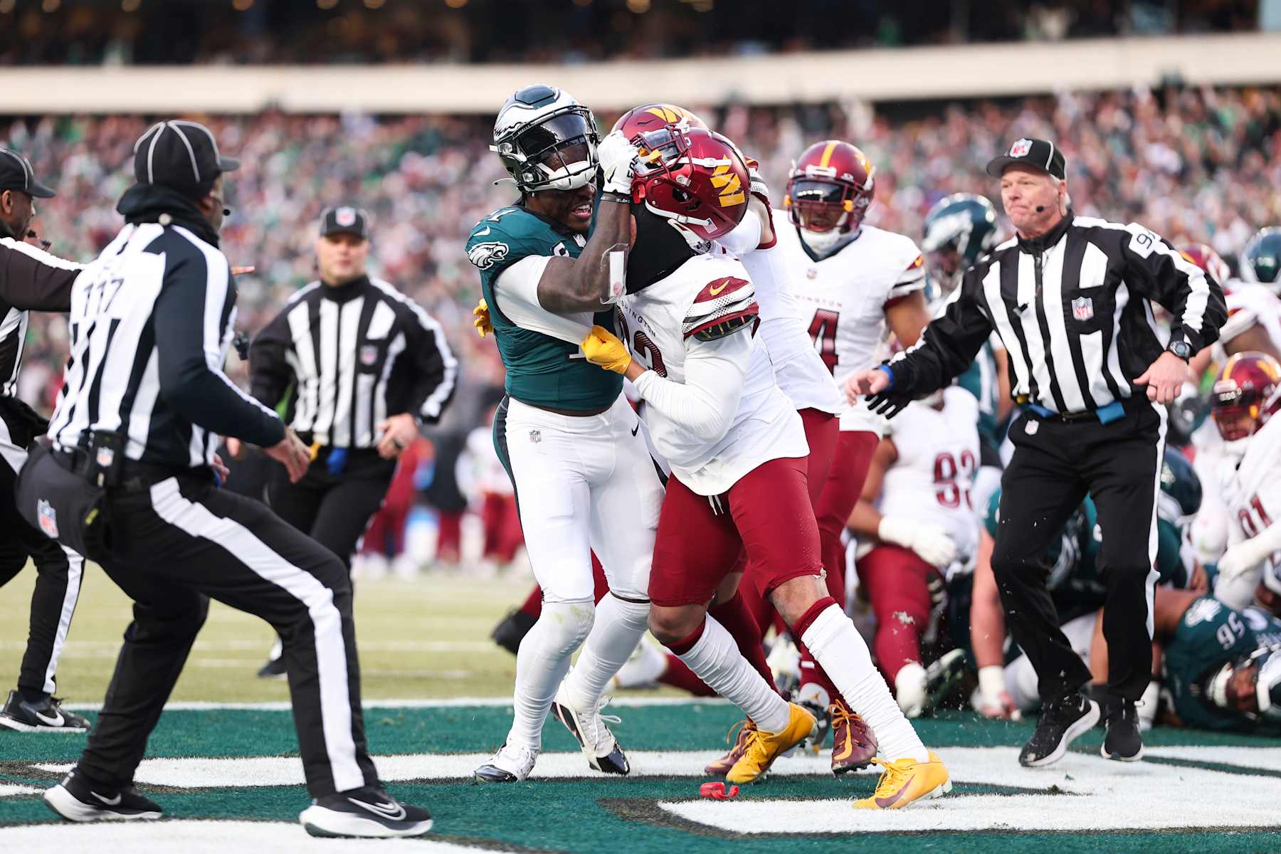 PHILADELPHIA, PENNSYLVANIA - JANUARY 26: A.J. Brown #11 of the Philadelphia Eagles is pushed during the second quarter in the NFC Championship Game by 	Marshon Lattimore #23 of the Washington Commanders at Lincoln Financial Field on January 26, 2025 in Philadelphia, Pennsylvania. (Photo by Kathryn Riley/Getty Images)