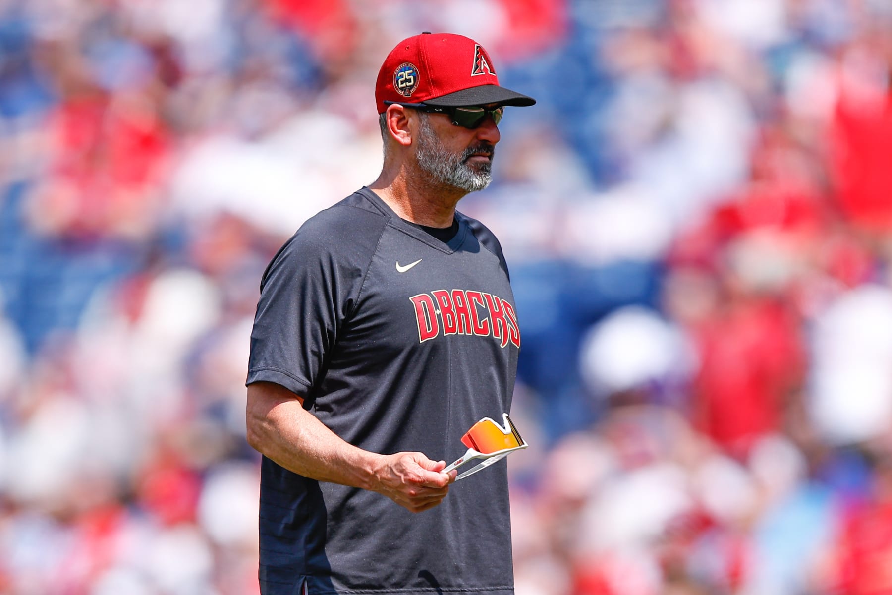 PHILADELPHIA, PA - MAY 24:  Torey Lovullo #17 of the Arizona Diamondbacks walks back to the dugout  during the game against the Philadelphia Phillies at Citizens Bank Park on May 24, 2023 in Philadelphia, Pennsylvania.  (Photo by Rich Graessle/Icon Sportswire via Getty Images)