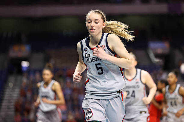 SAN ANTONIO, TEXAS - APRIL 02: Paige Bueckers #5 of the UConn Huskies runs off of the court after losing to the Arizona Wildcats in the Final Four semifinal game of the 2021 NCAA Women's Basketball Tournament at the Alamodome on April 02, 2021 in San Antonio, Texas. (Photo by Elsa/Getty Images)