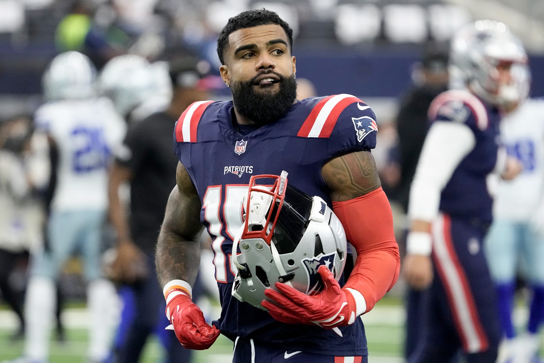 ARLINGTON, TEXAS - OCTOBER 01: Ezekiel Elliott #15 of the New England Patriots looks on prior to a game against the Dallas Cowboys at AT&T Stadium on October 01, 2023 in Arlington, Texas. (Photo by Sam Hodde/Getty Images)
