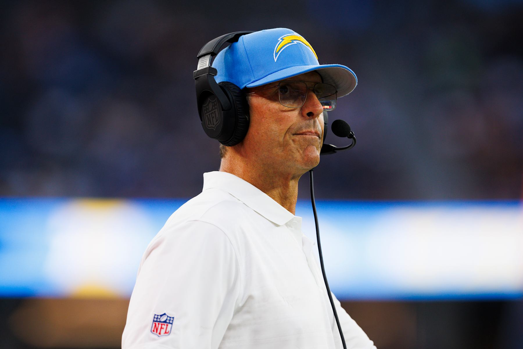 INGLEWOOD, CALIFORNIA - AUGUST 17: Jim Harbaugh of the Los Angeles Chargers on the sideline during a preseason game against the Los Angeles Rams at SoFi Stadium on August 17, 2024 in Inglewood, California. (Photo by Ric Tapia/Getty Images)