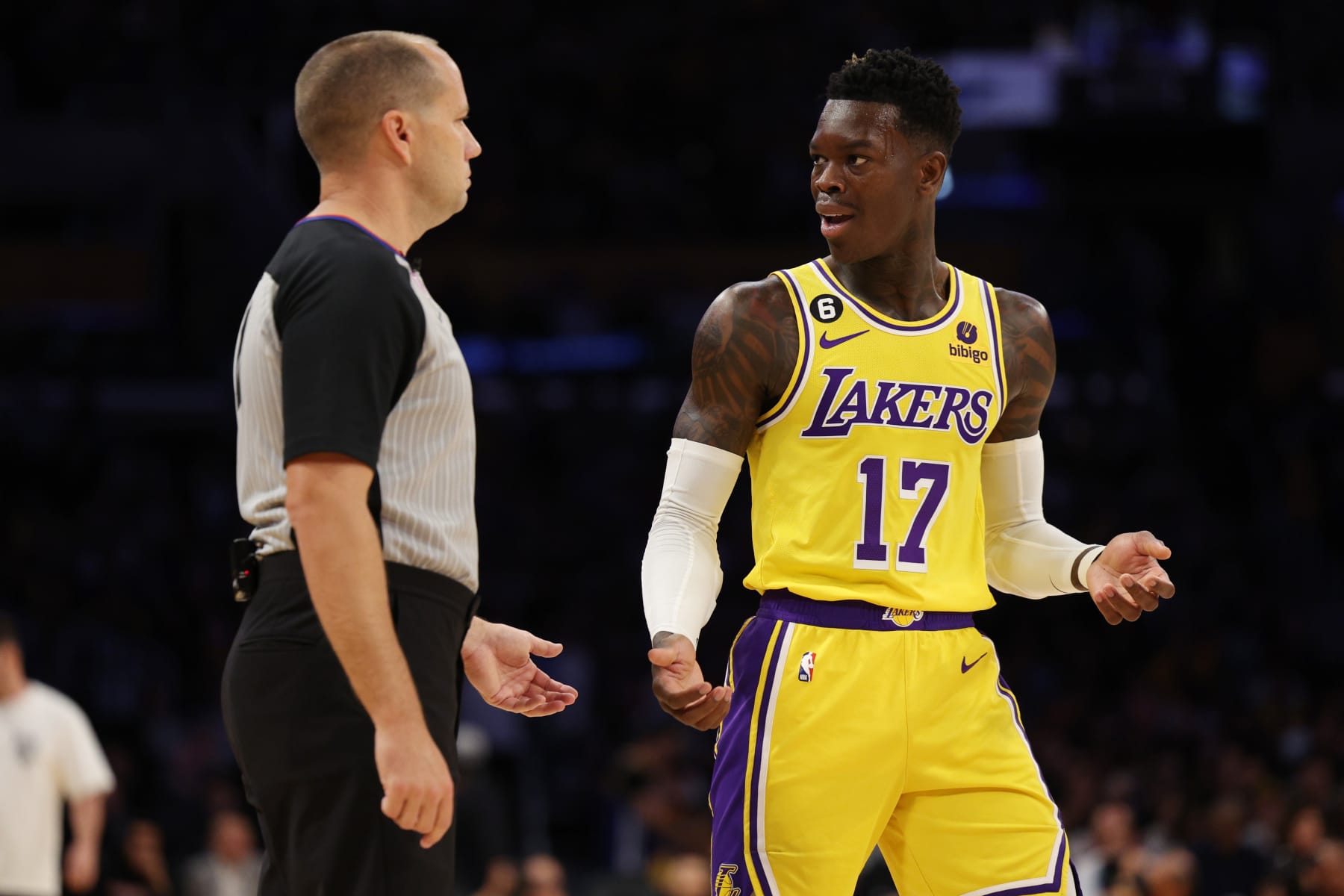 LOS ANGELES, CALIFORNIA - MAY 12: Dennis Schroder #17 of the Los Angeles Lakers speaks with referee John Goble #10 during the first quarter against the Golden State Warriors in game six of the Western Conference Semifinal Playoffs at Crypto.com Arena on May 12, 2023 in Los Angeles, California. NOTE TO USER: User expressly acknowledges and agrees that, by downloading and or using this photograph, User is consenting to the terms and conditions of the Getty Images License Agreement. (Photo by Harry How/Getty Images)