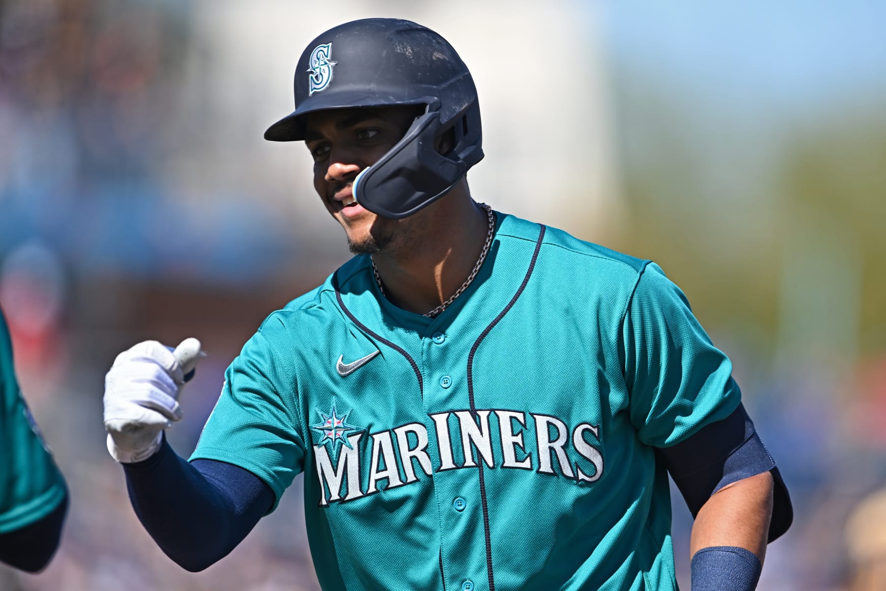 PEORIA, ARIZONA - FEBRUARY 24, 2023: Julio Rodríguez #44 of the Seattle Mariners celebrates hitting a single during the first inning of a spring training game against the San Diego Padres at Peoria Stadium on February 24, 2023 in Peoria, Arizona. (Photo by Chris Bernacchi/Diamond Images via Getty Images)