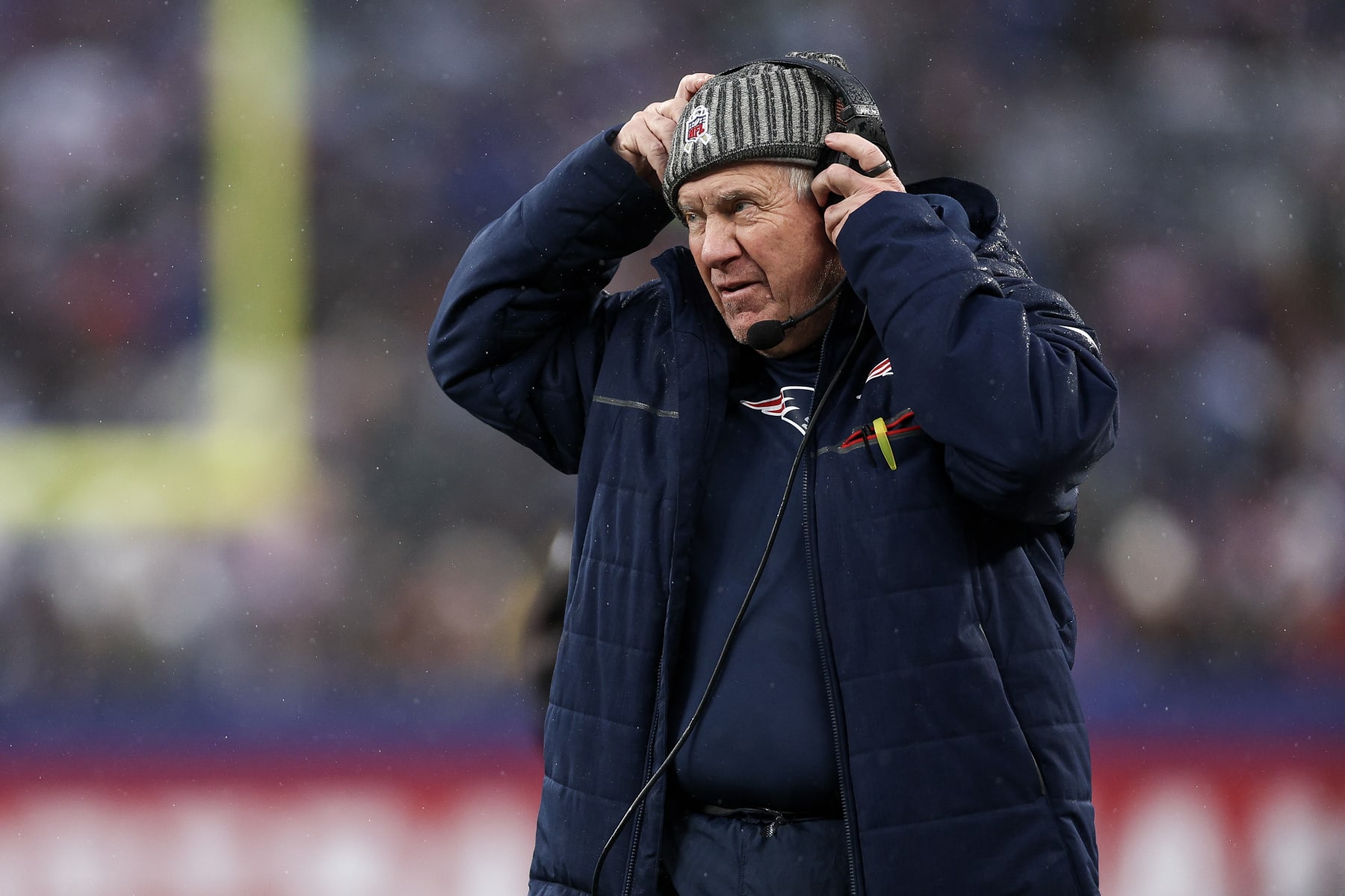 EAST RUTHERFORD, NEW JERSEY - NOVEMBER 26: Head coach Bill Belichick of the New England Patriots looks on during the second half against the New York Giantsat MetLife Stadium on November 26, 2023 in East Rutherford, New Jersey. (Photo by Elsa/Getty Images)