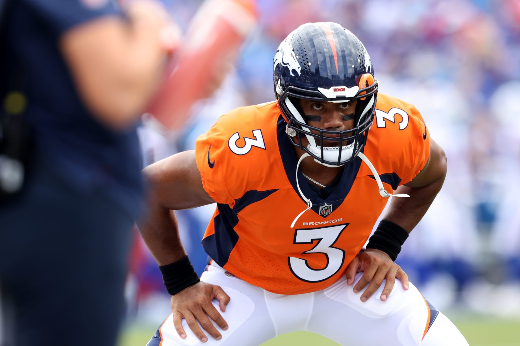 ORCHARD PARK, NEW YORK - AUGUST 20: Russell Wilson #3 of the Denver Broncos stretches prior to a preseason game against the Buffalo Bills at Highmark Stadium on August 20, 2022 in Orchard Park, New York. (Photo by Bryan Bennett/Getty Images)