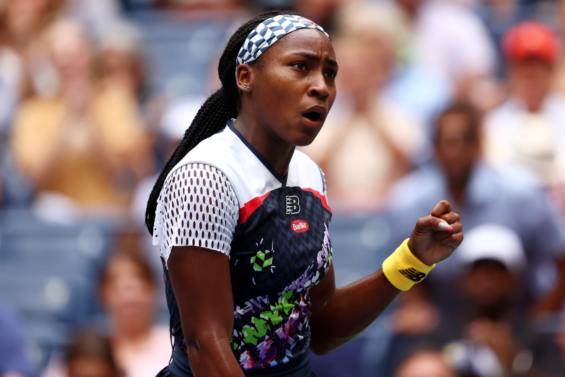 NEW YORK, NEW YORK - SEPTEMBER 04: Coco Gauff of the United States reacts against Shuai Zhang of China during their Women's Singles Fourth Round match on Day Seven of the 2022 US Open at USTA Billie Jean King National Tennis Center on September 04, 2022 in the Flushing neighborhood of the Queens borough of New York City. (Photo by Elsa/Getty Images)