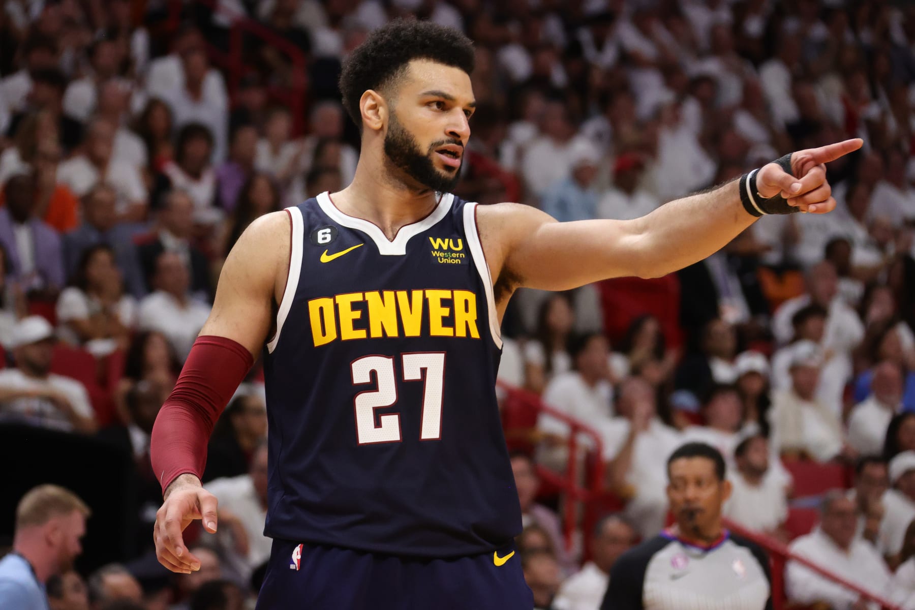 MIAMI, FL - JUNE 9: Jamal Murray #27 of the Denver Nuggets celebrates during Game Four of the 2023 NBA Finals against the Miami Heat on June 9, 2023 at Kaseya Center in Miami, Florida. NOTE TO USER: User expressly acknowledges and agrees that, by downloading and or using this Photograph, user is consenting to the terms and conditions of the Getty Images License Agreement. Mandatory Copyright Notice: Copyright 2023 NBAE (Photo by Nathaniel S. Butler/NBAE via Getty Images)