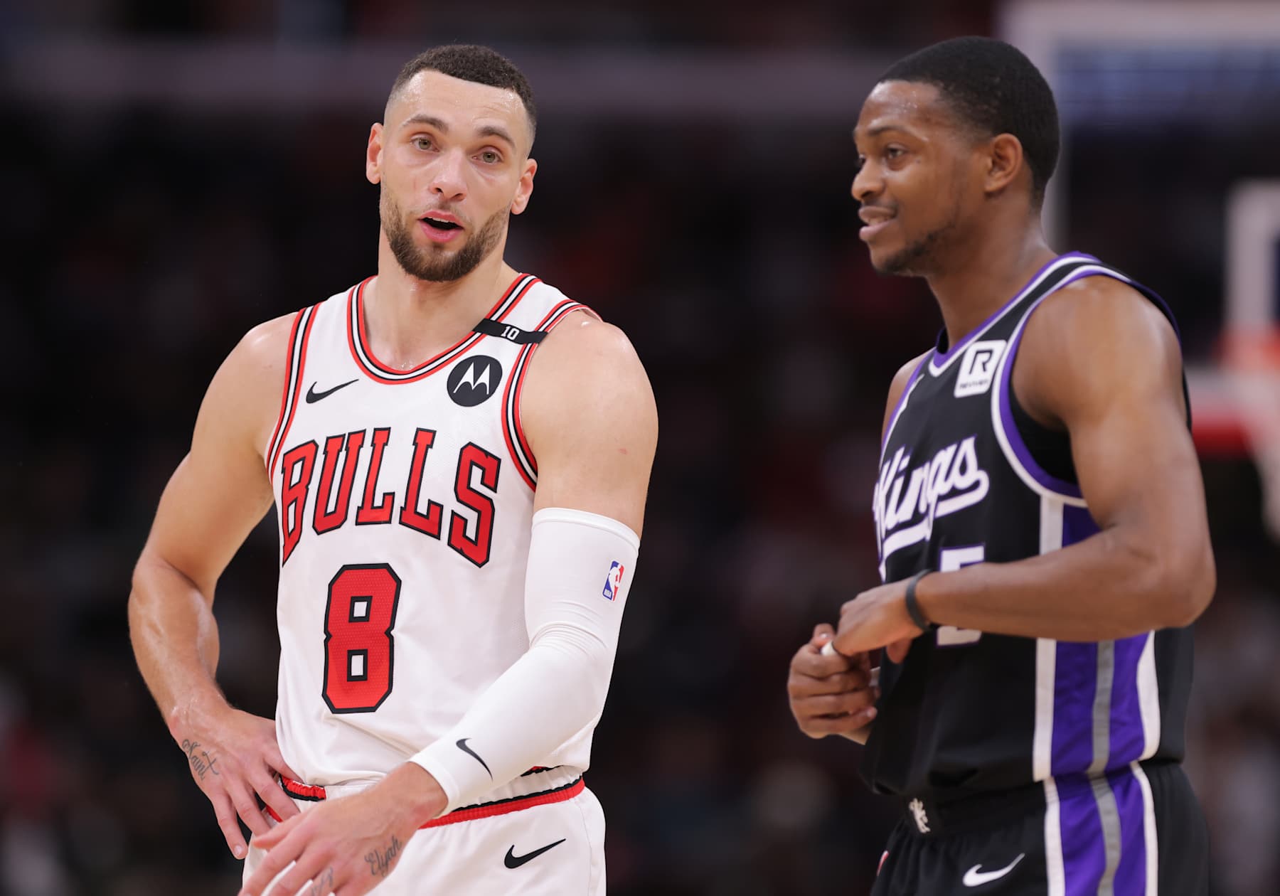CHICAGO, IL - JANUARY 12: Zach LaVine #8 of the Chicago Bulls chats with De'Aaron Fox #5 of the Sacramento Kings during the first half on January 12, 2025 at the United Center in Chicago, Illinois. (Photo by Melissa Tamez/Icon Sportswire via Getty Images)
