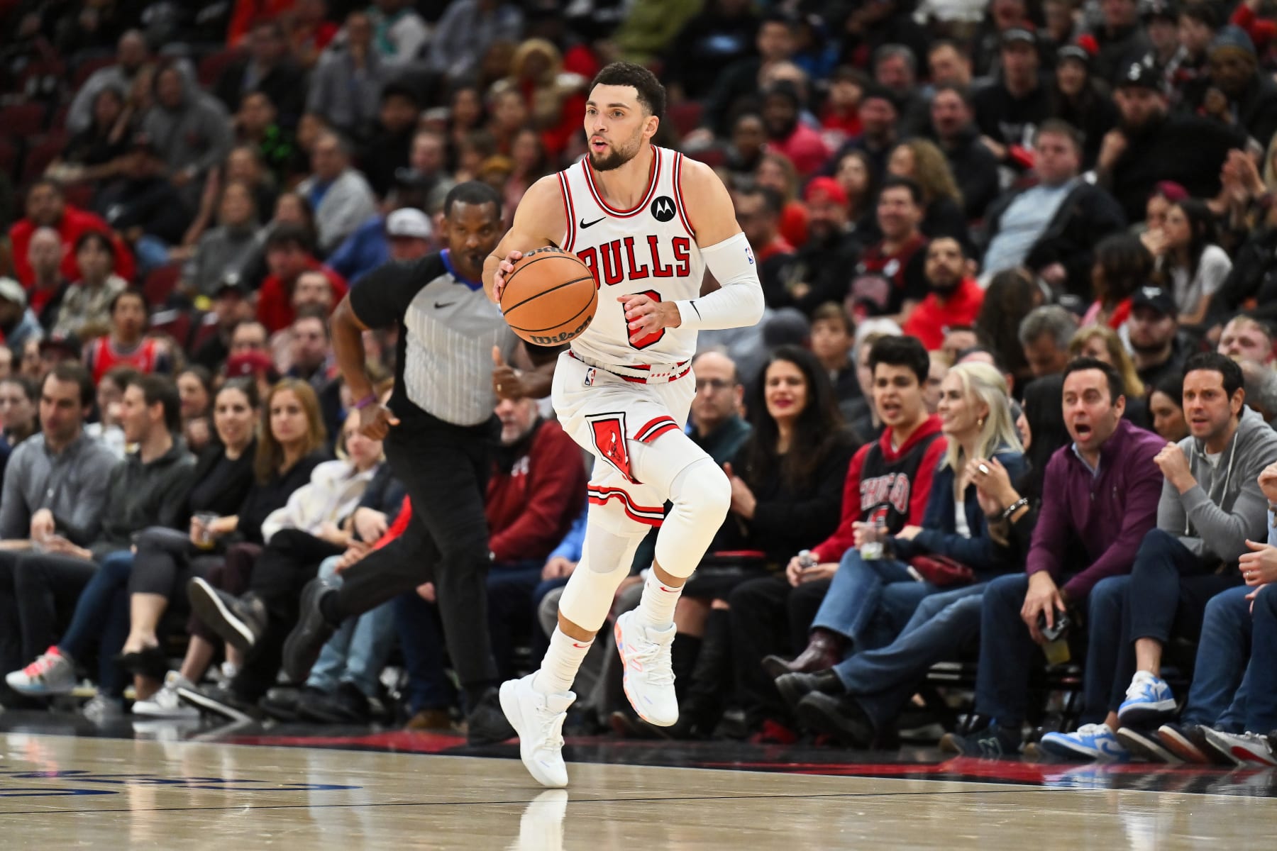 CHICAGO, ILLINOIS - NOVEMBER 15:  Zach Lavine #8 of the Chicago Bulls controls the ball against the Orlando Magic on November 15, 2023 at United Center in Chicago, Illinois.   NOTE TO USER: User expressly acknowledges and agrees that, by downloading and or using this photograph, User is consenting to the terms and conditions of the Getty Images License Agreement.  (Photo by Jamie Sabau/Getty Images)