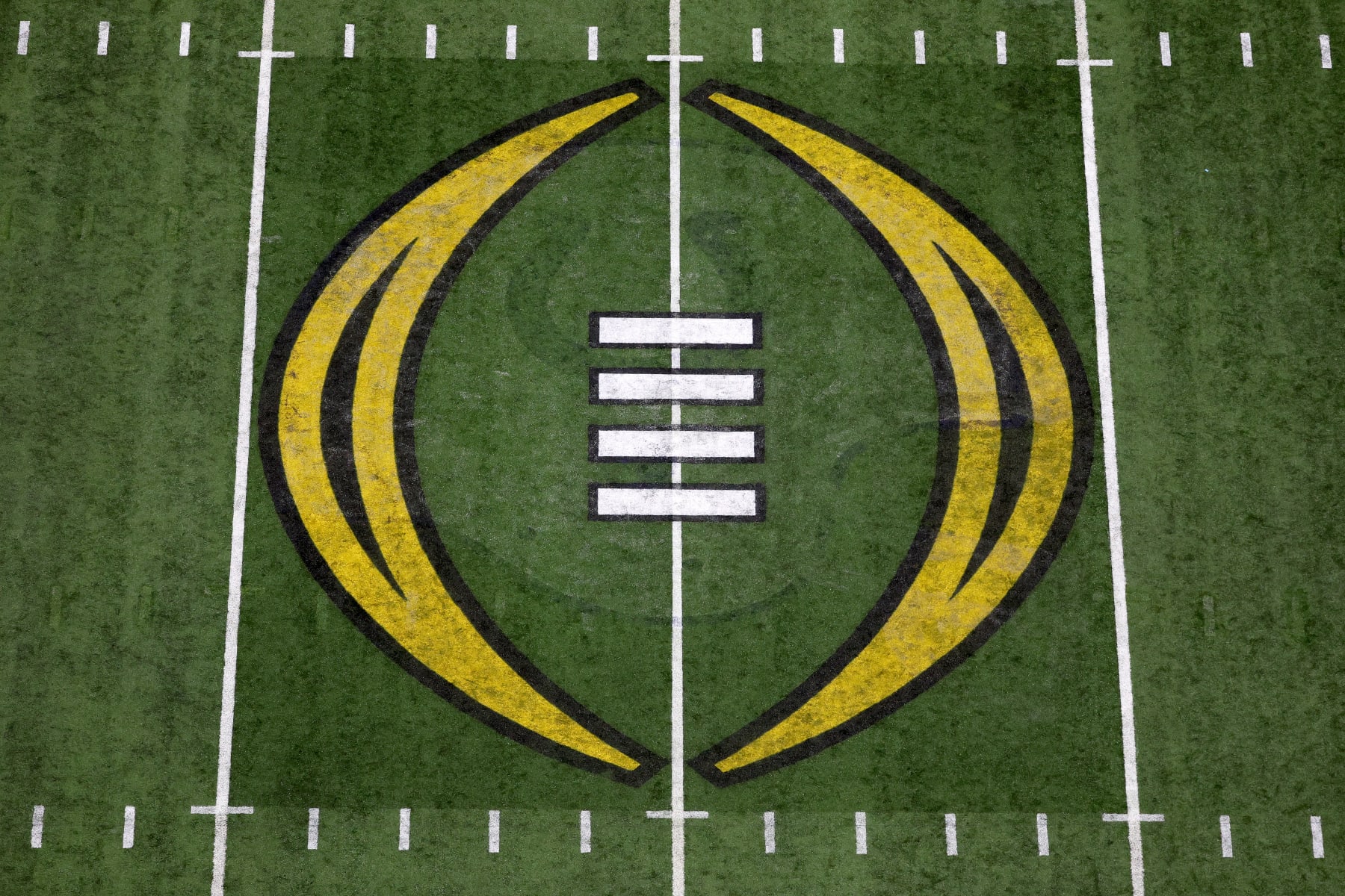 INDIANAPOLIS, INDIANA - JANUARY 10: The 2022 CFP National Championship logo is seen on the field before the game between the Georgia Bulldogs and the Alabama Crimson Tide during the 2022 CFP National Championship Game at Lucas Oil Stadium on January 10, 2022 in Indianapolis, Indiana. (Photo by Dylan Buell/Getty Images)