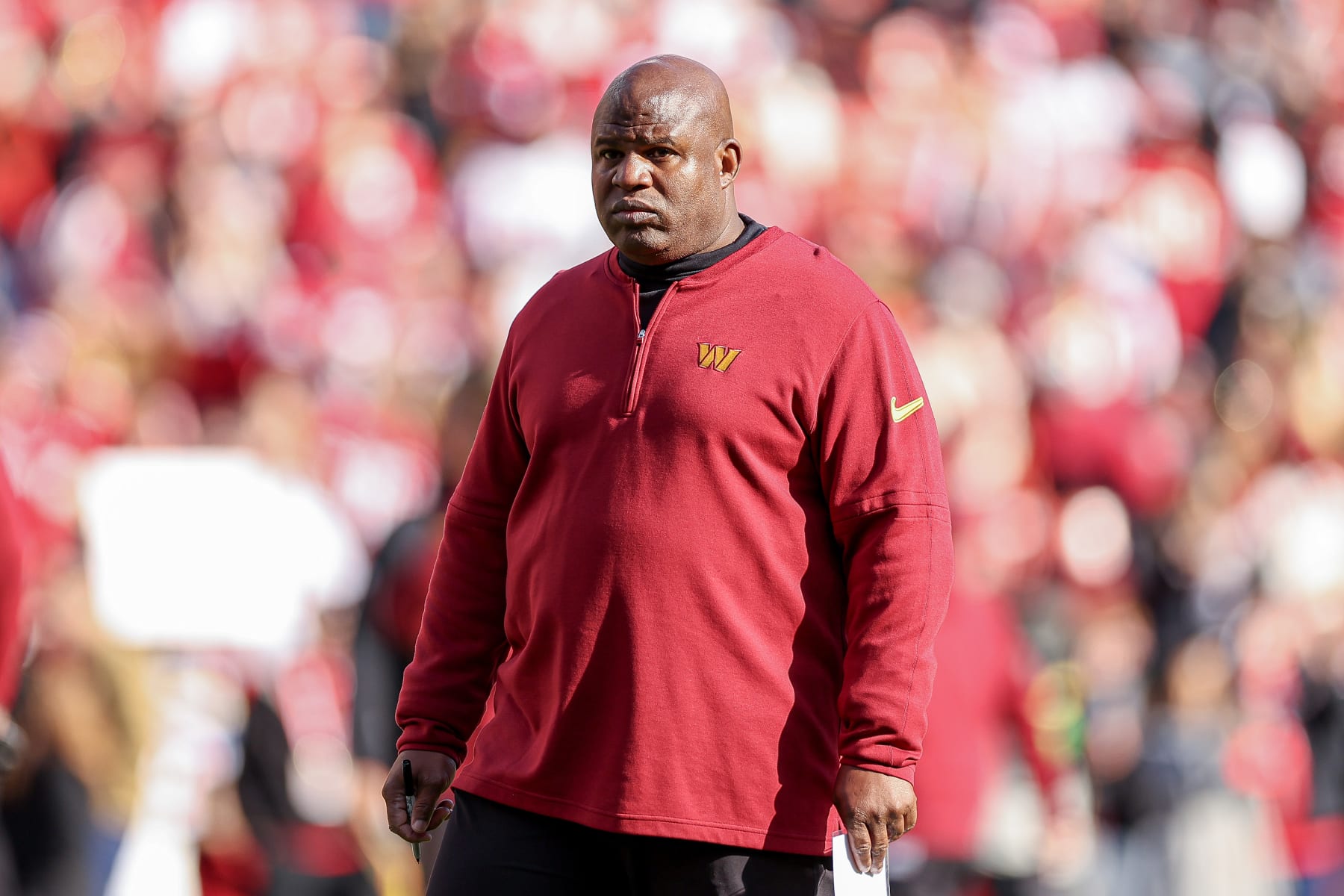 LANDOVER, MARYLAND - DECEMBER 31: Offensive coordinator Eric Bieniemy of the Washington Commanders looks on prior to a game against the San Francisco 49ers FedExField on December 31, 2023 in Landover, Maryland. (Photo by Scott Taetsch/Getty Images)