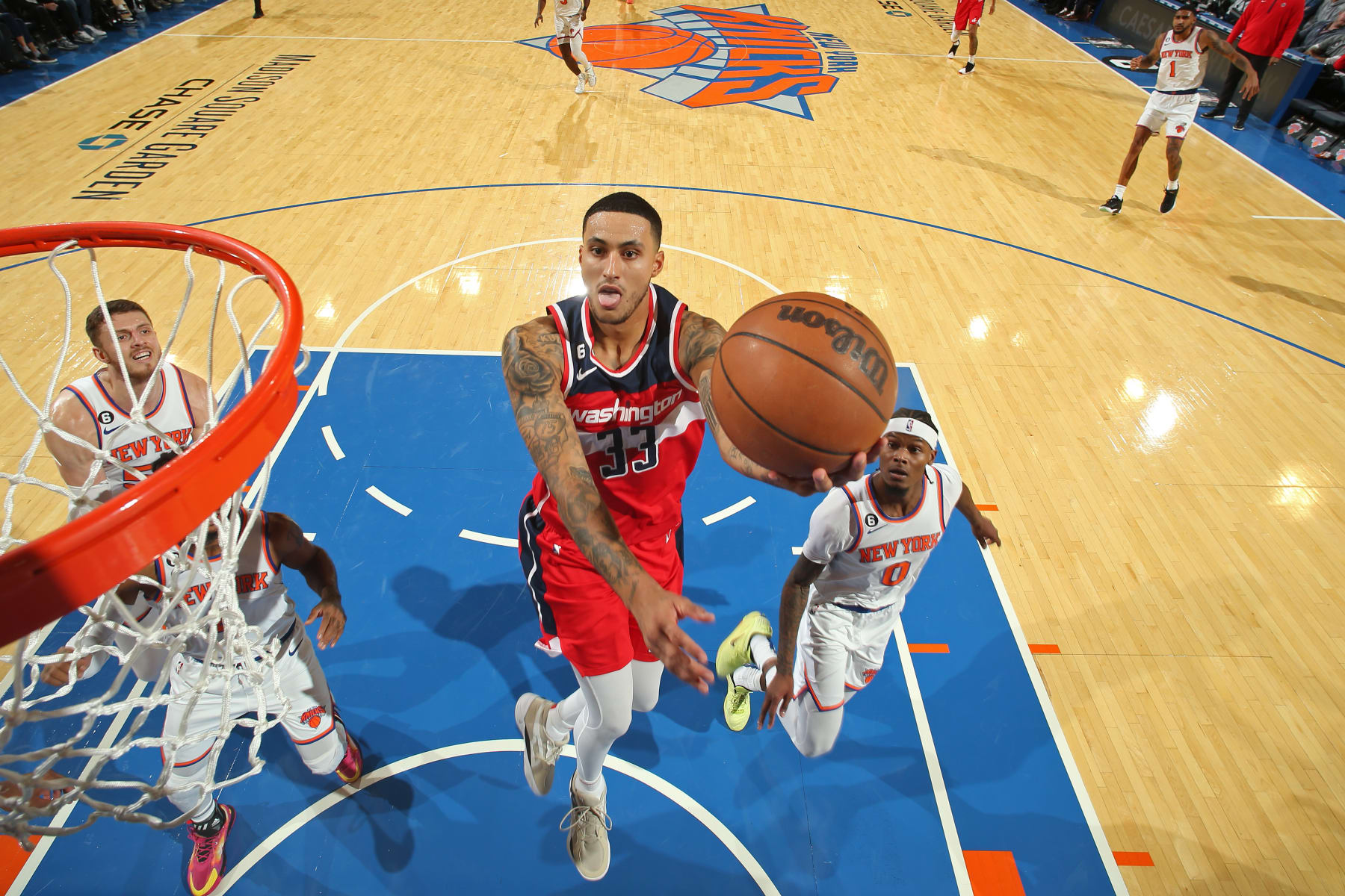 NEW YORK, NY - OCTOBER 14:  Kyle Kuzma #33 of the Washington Wizards drives to the basket during the game against the New York Knicks on October 14, 2022 at Madison Square Garden in New York City, New York. NOTE TO USER: User expressly acknowledges and agrees that, by downloading and or using this photograph, User is consenting to the terms and conditions of the Getty Images License Agreement. Mandatory Copyright Notice: Copyright 2022 NBAE (Photo by Nathaniel S. Butler/NBAE via Getty Images)